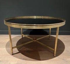 Large Round Brass Coffee Table with Black Lacquered Glass Top by Maison Jansen