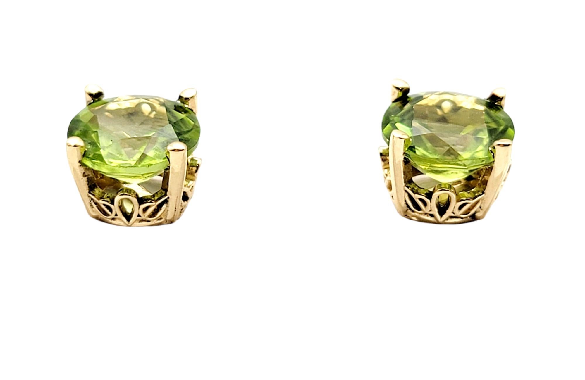 Simple yet timeless peridot solitaire stud earrings. These gorgeous bright yellowish-green peridot and 14 karat yellow gold pierced ear studs are the epitome of minimalist elegance. They give just the right pop of color for everyday wear and the