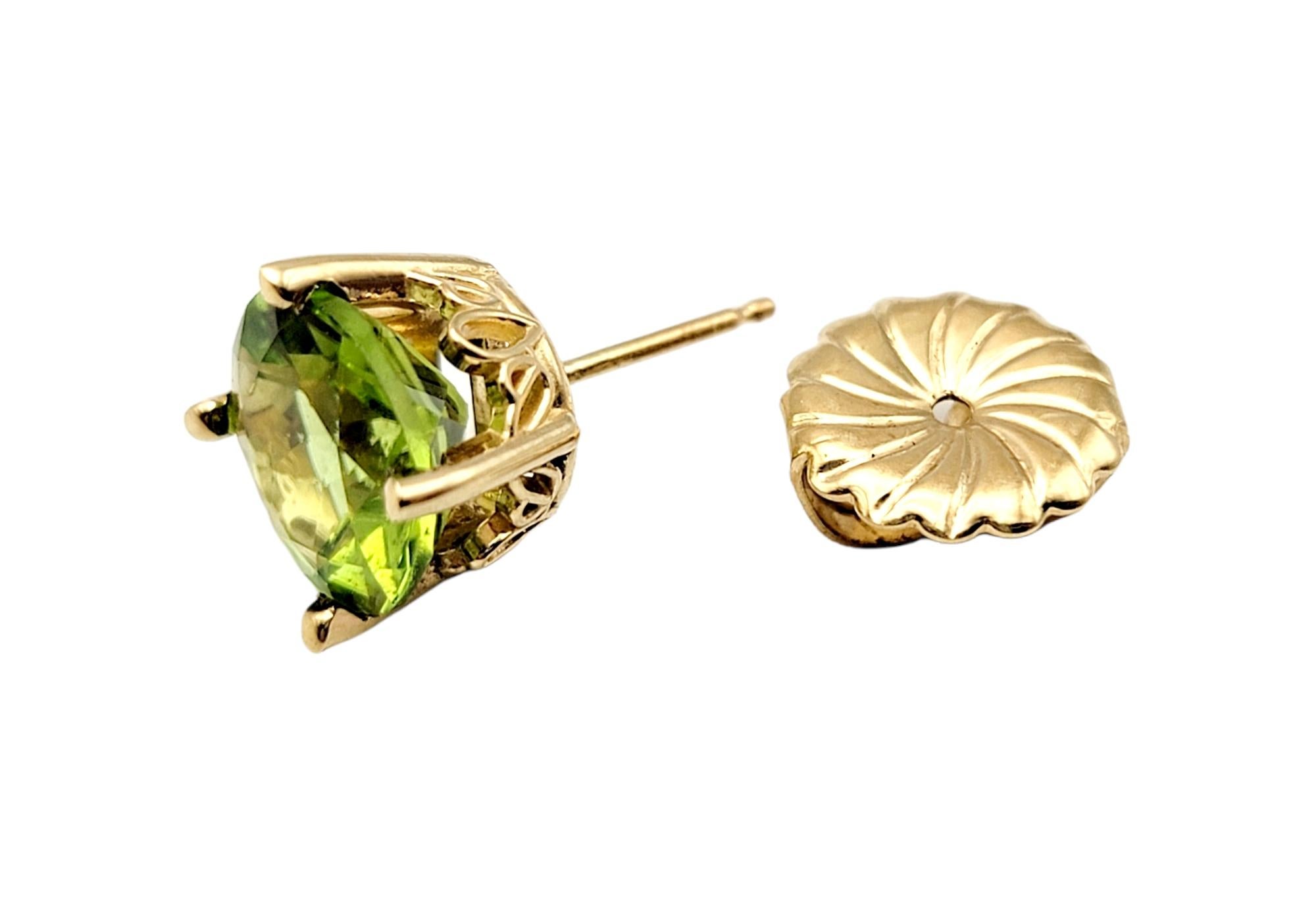 Round Cut Large Round Brilliant Solitaire Green Peridot Stud Earrings in Yellow Gold For Sale