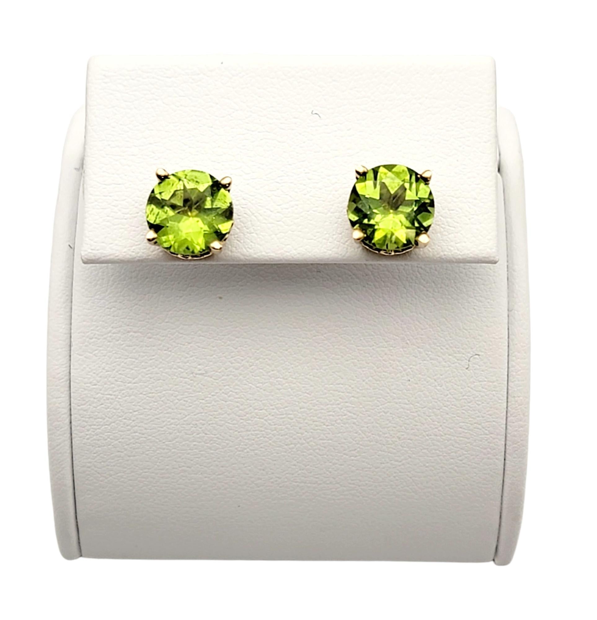 Women's or Men's Large Round Brilliant Solitaire Green Peridot Stud Earrings in Yellow Gold For Sale