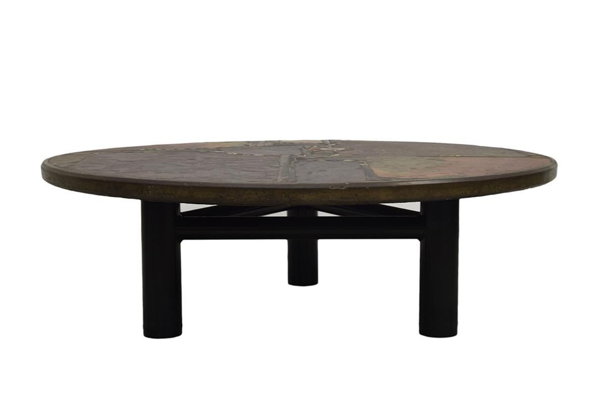 Extraordinary Brutalist coffee table, handmade and designed by the late Dutch artist Paul Kingma in the 1980s. 1985 to be exact. Every table is a one of a kind piece, this one has an exceptional composition and is lager than usual. Paul Kingma used