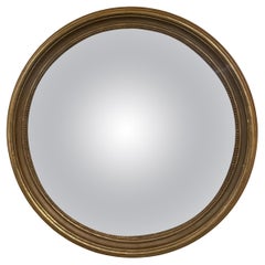 Grand miroir rond appelé Witch Mirror, du 19ème siècle