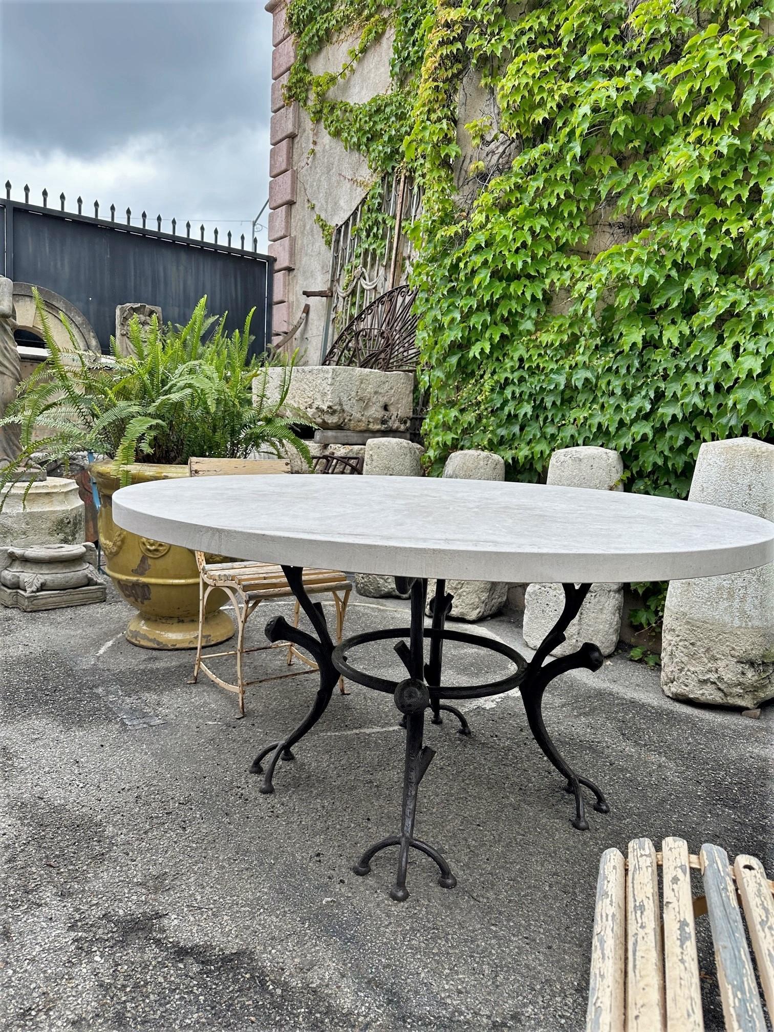 Large Round Carved Stone & Iron Garden Patio Dining Table Giacometti Style LA CA, For 8 people. Hand Crafted and carved round stone garden patio coffee outdoor indoor table for EIGHT people or more. It will be the perfect touch by an outdoor