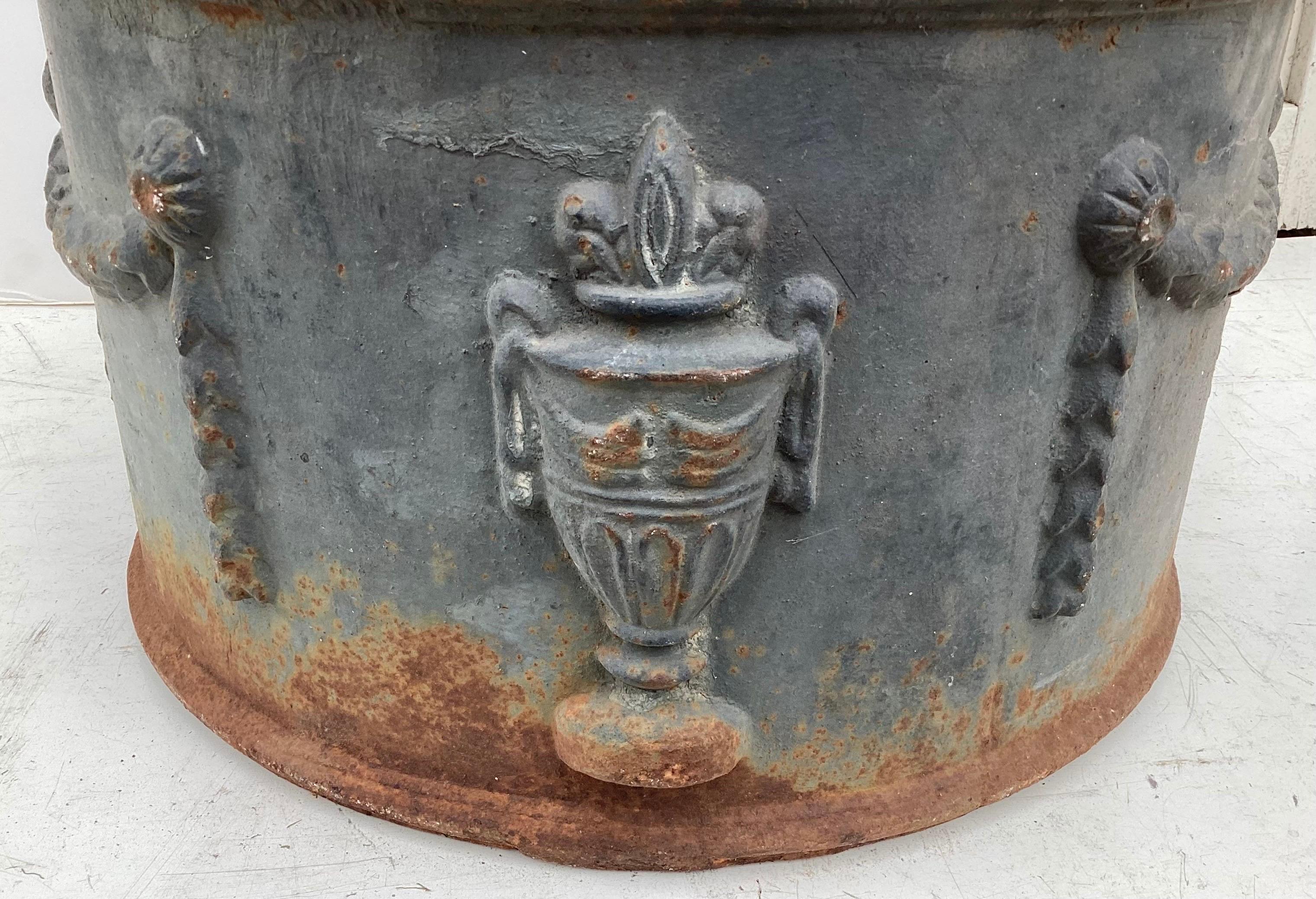 Large Round Cast Iron Planter with Greek Motif. Nice size. 16 1/2