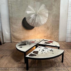 Large round coffee table in black metal and concrete