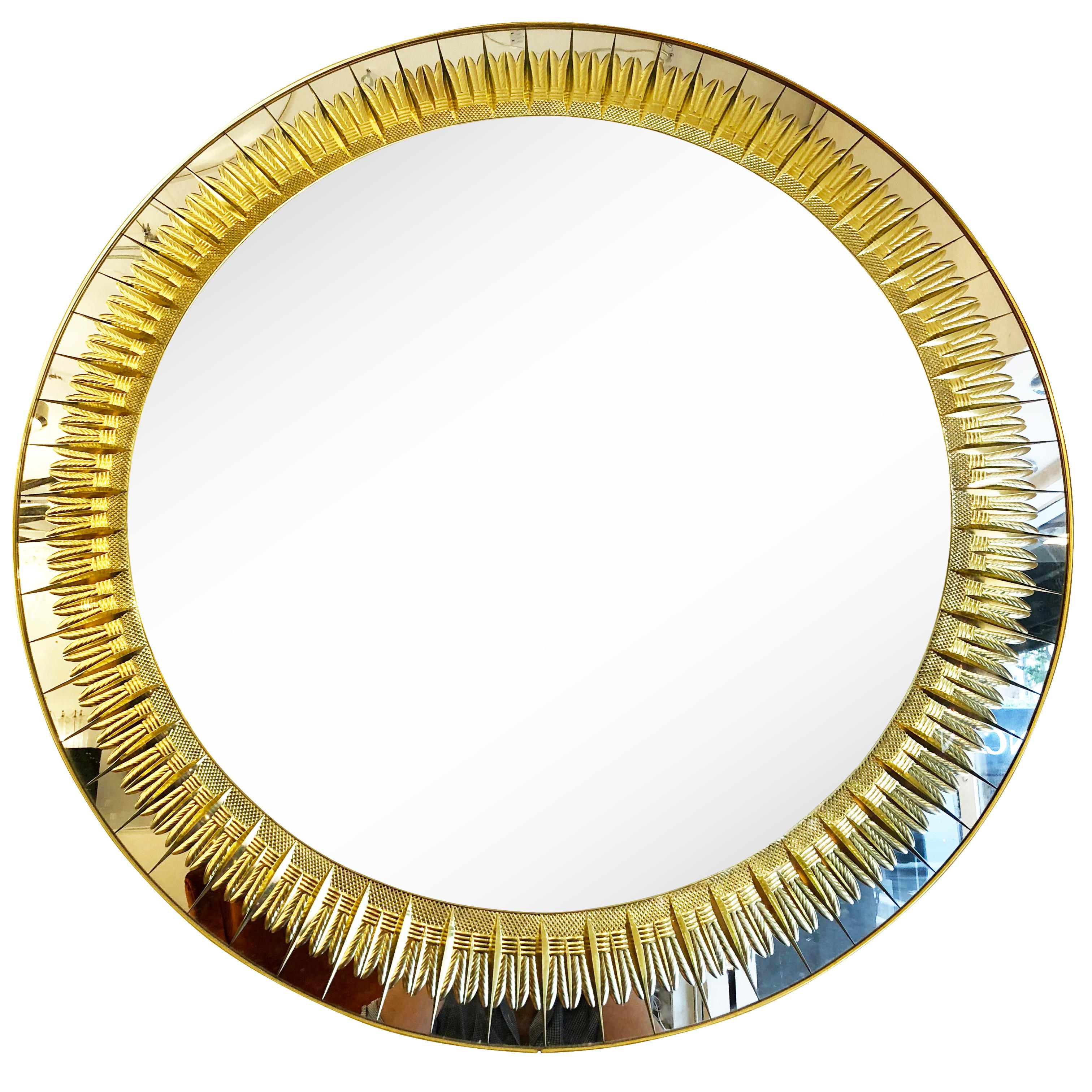 Large round midcentury mirror by Cristal Art with gold decorative engraving. The edge is brass and the frame wood.

Condition: Excellent vintage condition, minor wear consistent with age and use. Some age spots.

Measure: Diameter 39”

Depth