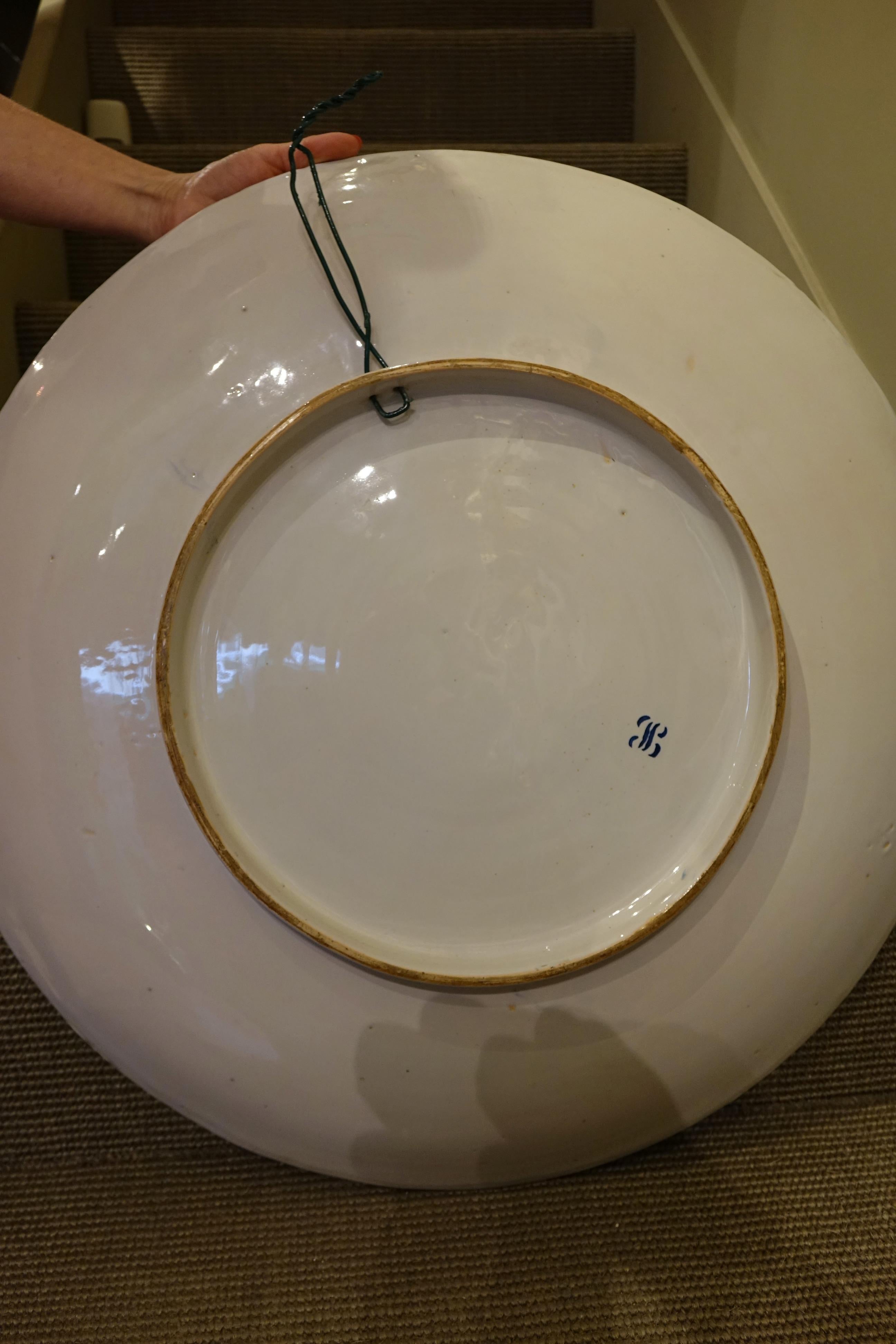 French Large round earthenware plate of Premieres , Circa 1880 For Sale