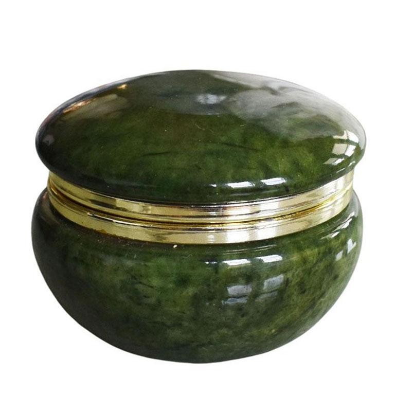 A lovely hand carved round Italian alabaster trinket box in deep emerald green on the inside, and very light green on the exterior. Larger in size than many we have come across, this piece will be fabulous to display on a coffee table or dressing
