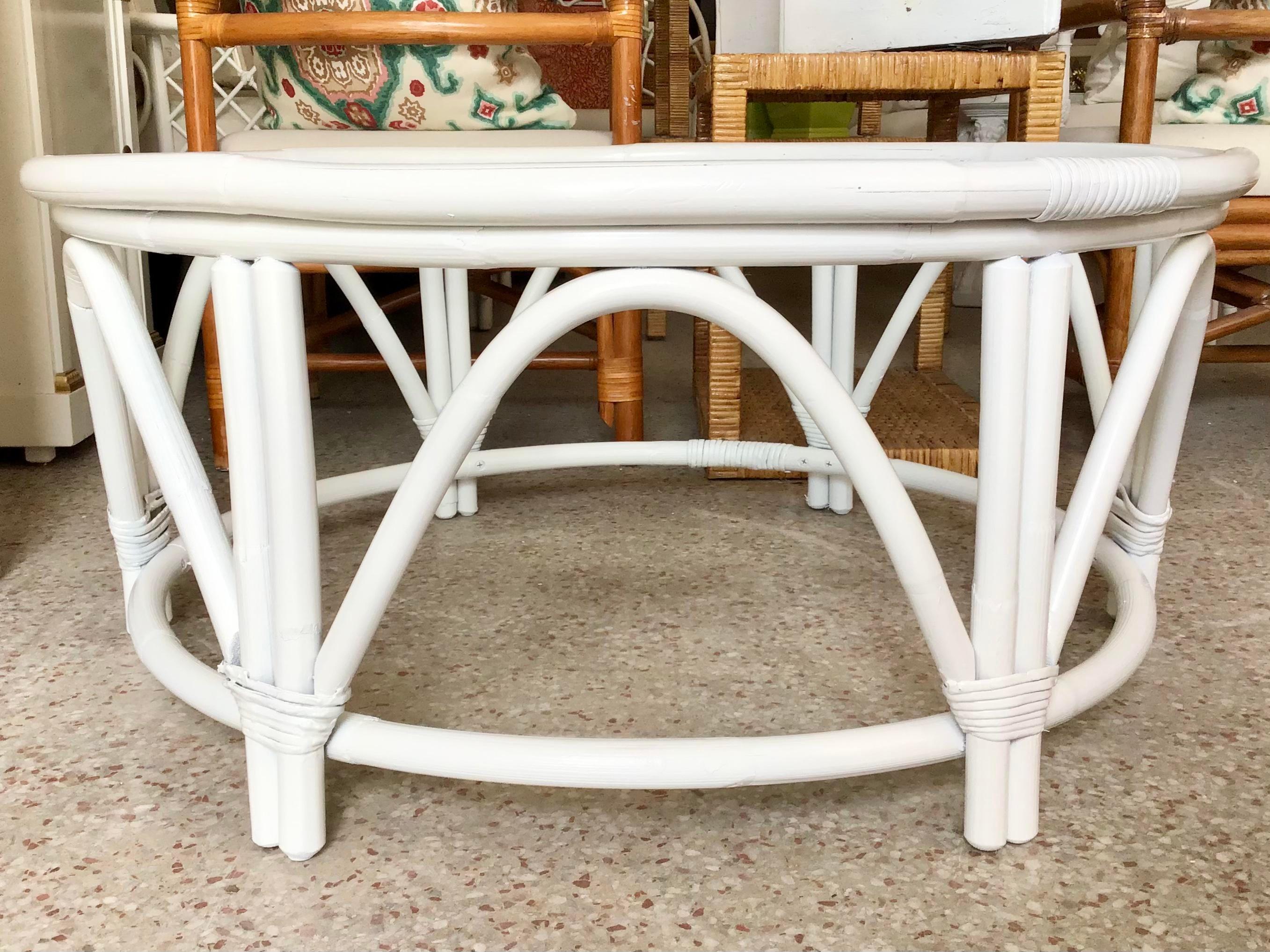 Very nice large Boho Chic rattan Ficks Reed coffee table in white and a glass top. This table makes a fabulous addition to your rattan collection in your living room.
