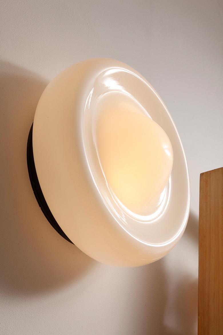 Mid-Century Modern Large round glass two-light milky white wall lamp in the Space Age style  For Sale