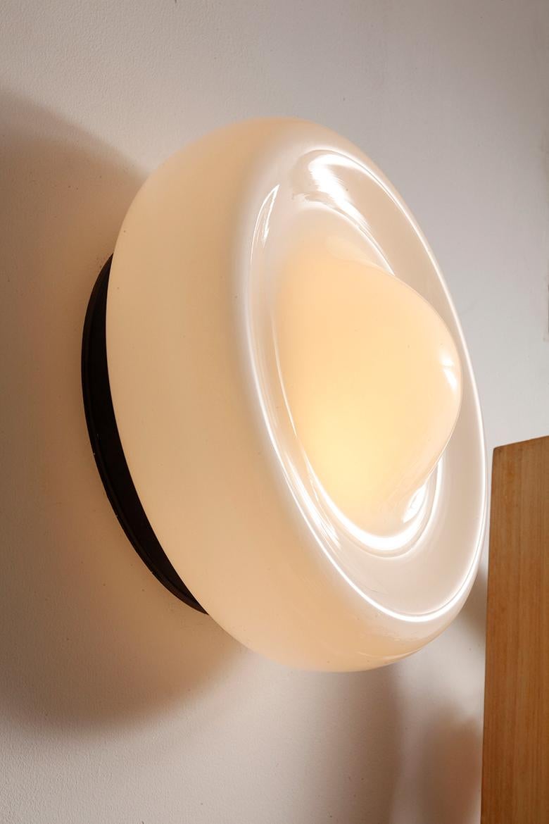 Metal Large round glass two-light milky white wall lamp in the Space Age style  For Sale