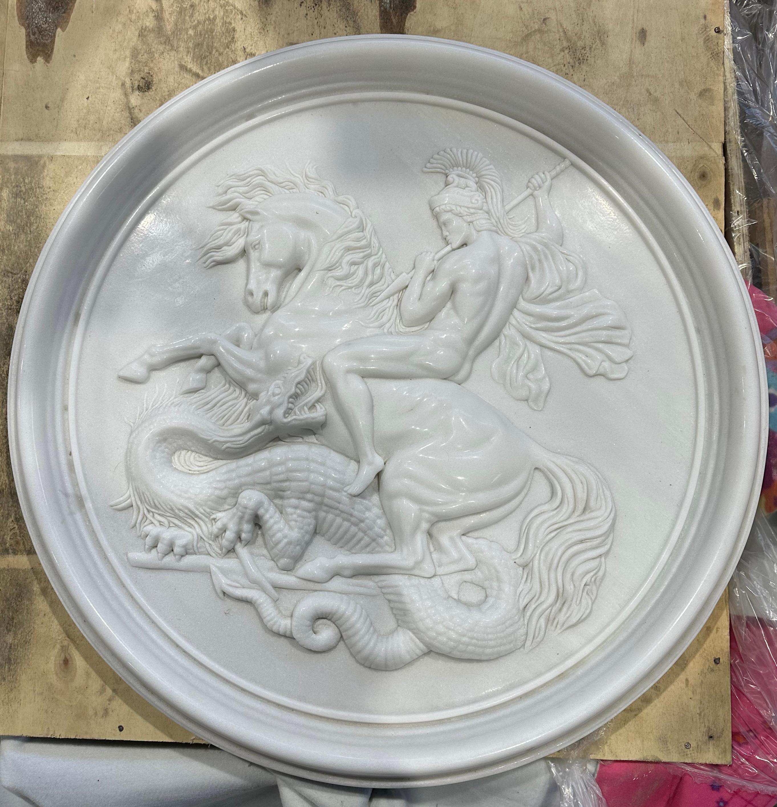 A highly decorative and skilfully crafted round white marble relief depicting Hercules and the serpent like dragon Ladon. Hercules was the son of Zeus in Greek Mythology. Ladon guarded the golden apples in the Garden of Hesperides. In pursuing his