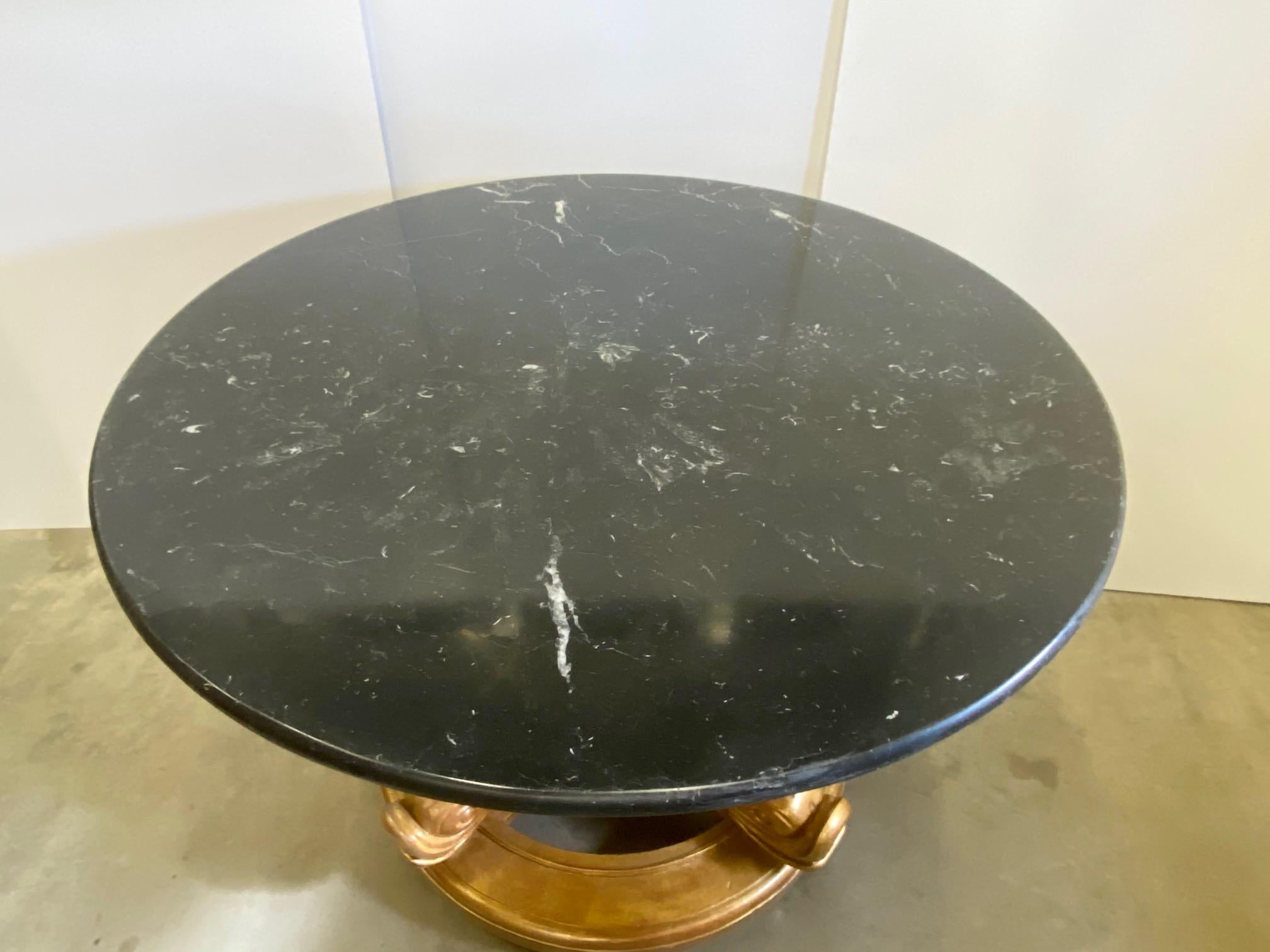 Large Round Marble Top Center with Gilt Wood Dolphin Base In Good Condition In Lambertville, NJ