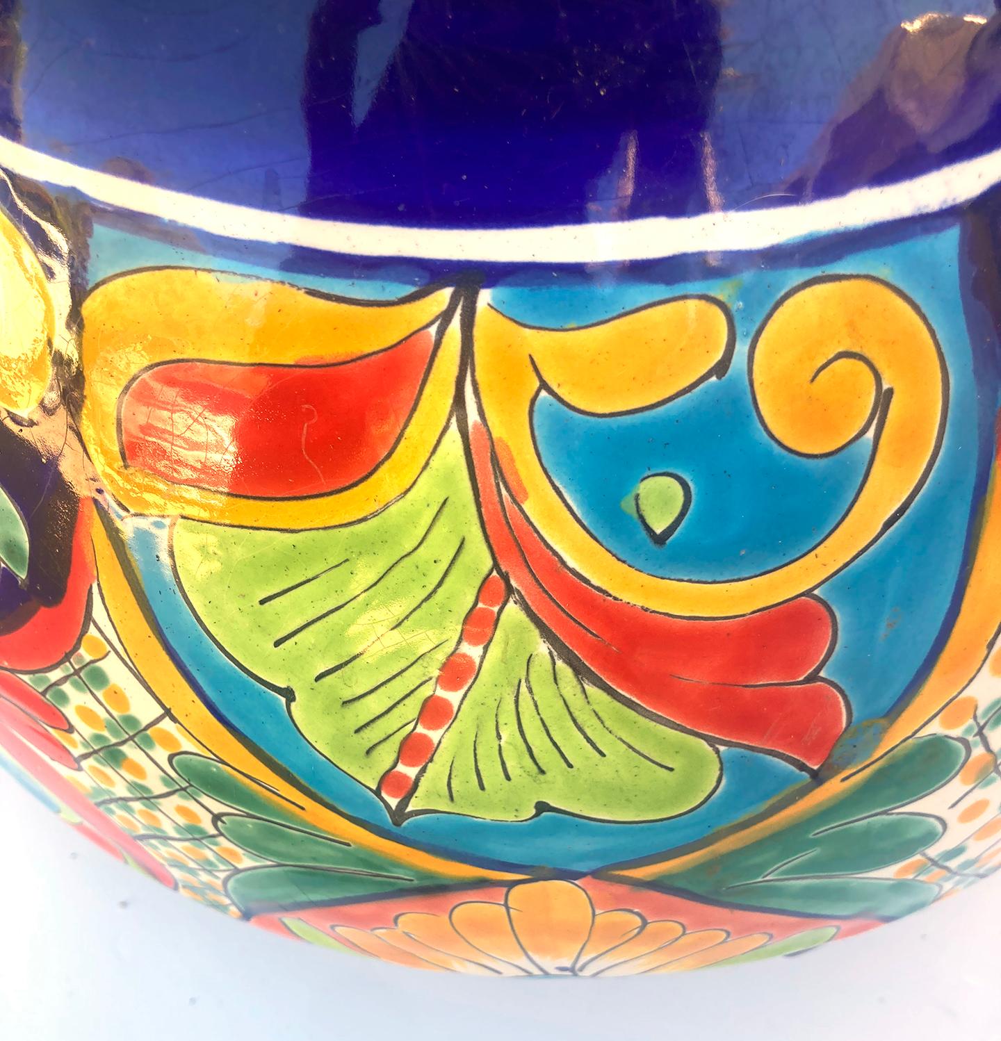 Talavera Michoacana planter pots in bright primary 
secondary colors are handmade and vibrantly hand-painted Mexican ceramic pottery. These pots are typically glazed and fired at high temperatures by skilled artisans in Mexico.
They feature