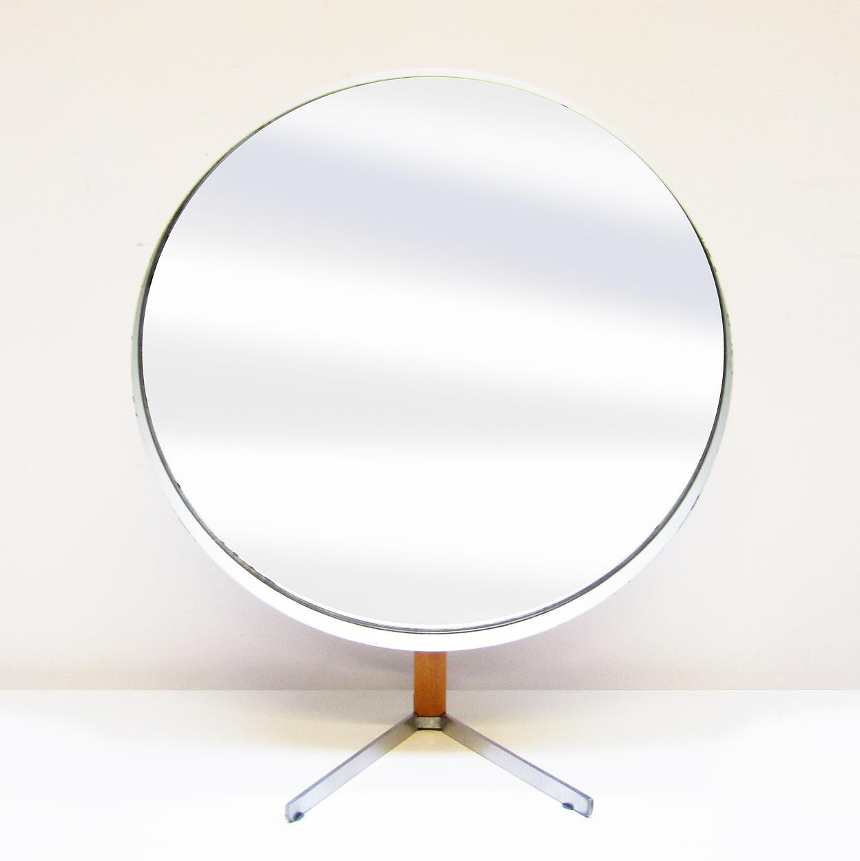 A large, circular, articulated 1960s table mirror by Robert Welch for Durlston Designs.

The mirror is 36cm (14