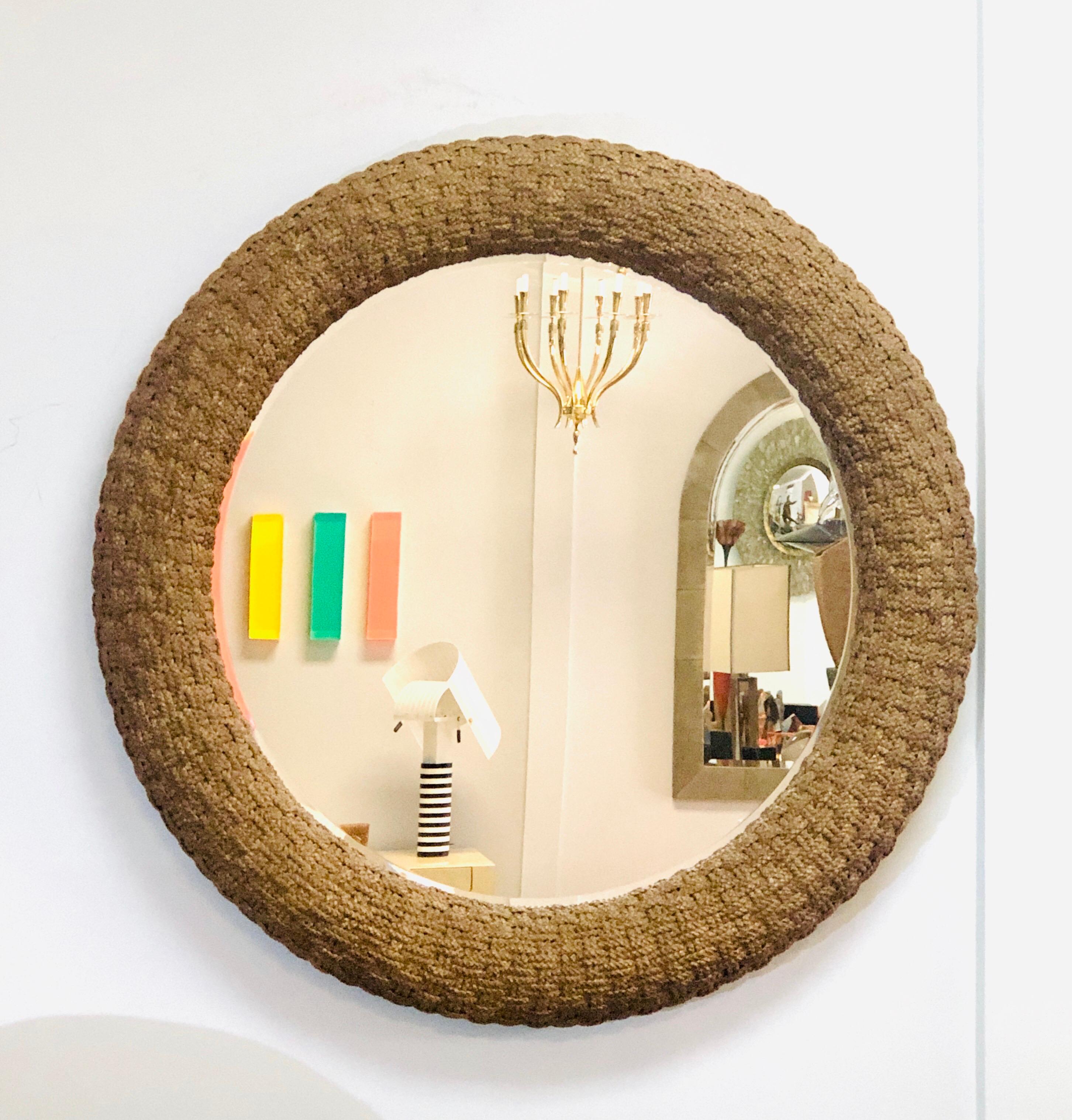 A large round mirror with a substantial 7