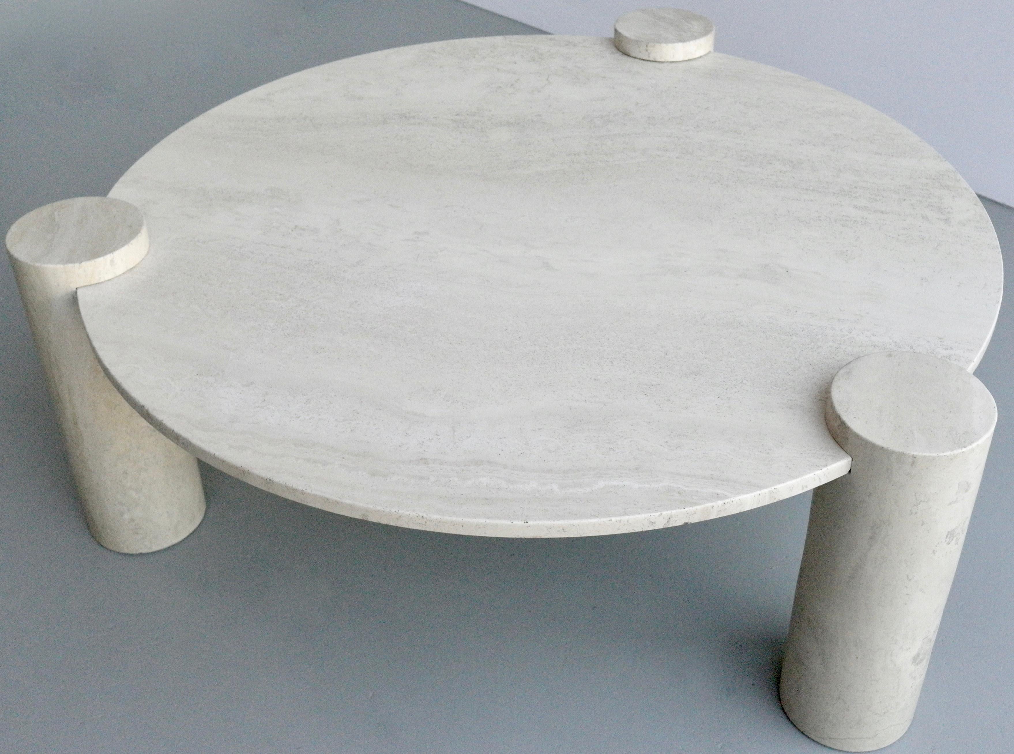 Large round organic three legged travertine coffee table, Italy, 1970s.

Diameter top 110 cm, total diameter incl legs 117.5. Height to the table top 40 cm, total height 45cm.
