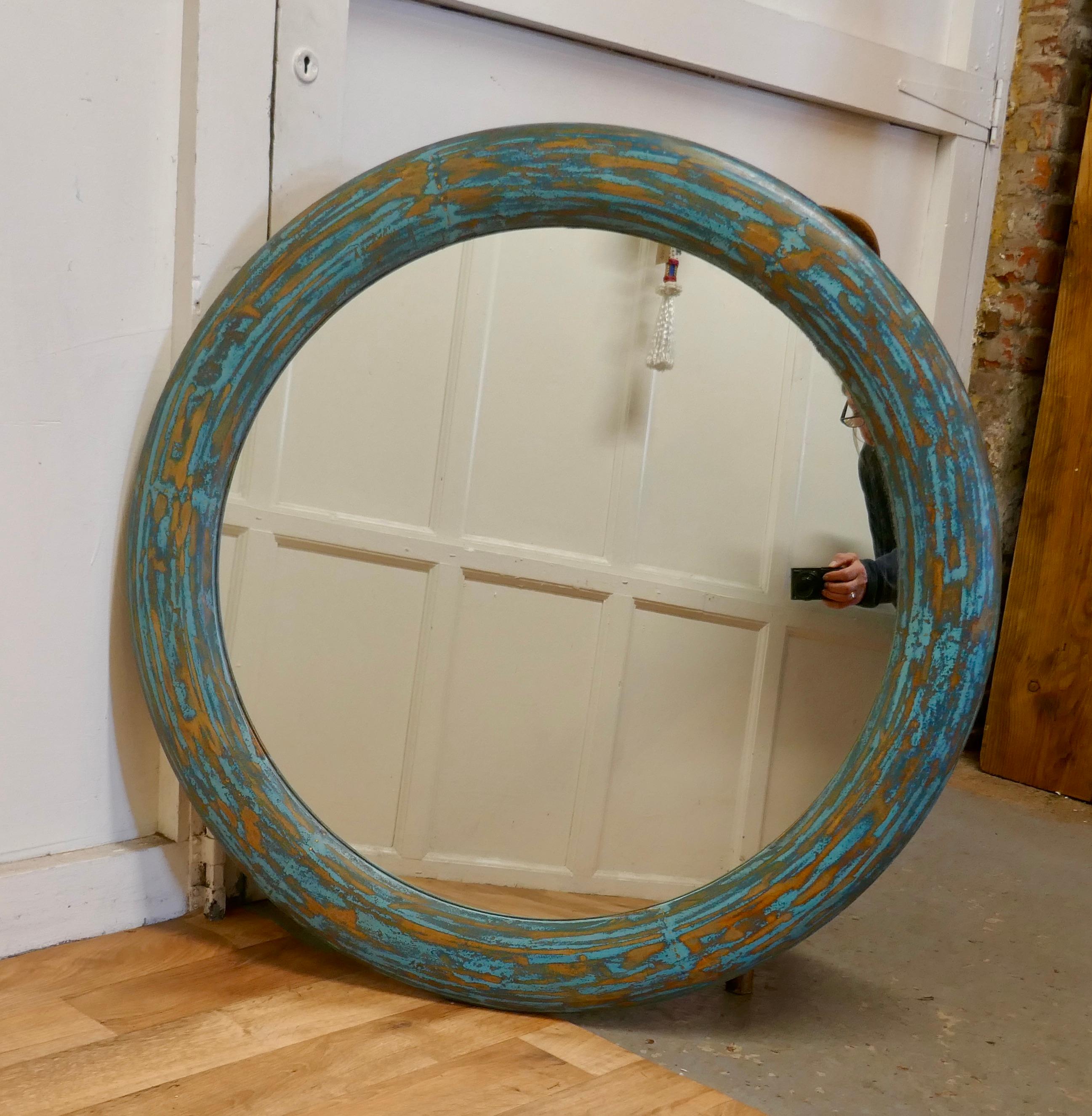 Large Round Painted Wall Mirror

This is a wonderful piece, the round mirror is set in a 4” wide D shaped Frame which has shabby blue painted finish.
The frame has a modern shabby look and the mirror glass is new

The mirror frame is 36” in