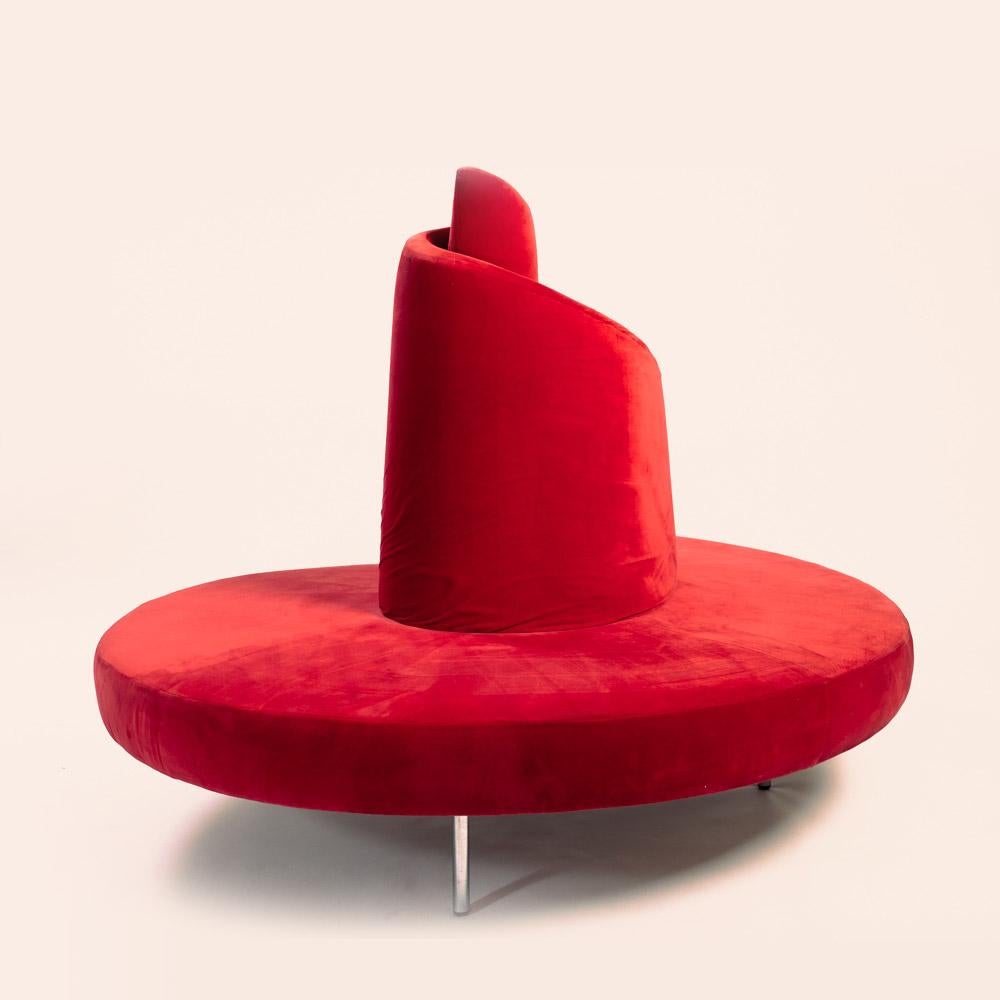 This red velvet Tatlin sofa was designed by Mario Cananzi and Roberto Semprini for Edra in the 1980s. Inspired by the famous Tatlin tower, a symbol of constructivism created by Vladimir Tatlin.

This sofa is upholstered in its original red