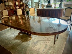 Large  round regency style dining table converts to long oval