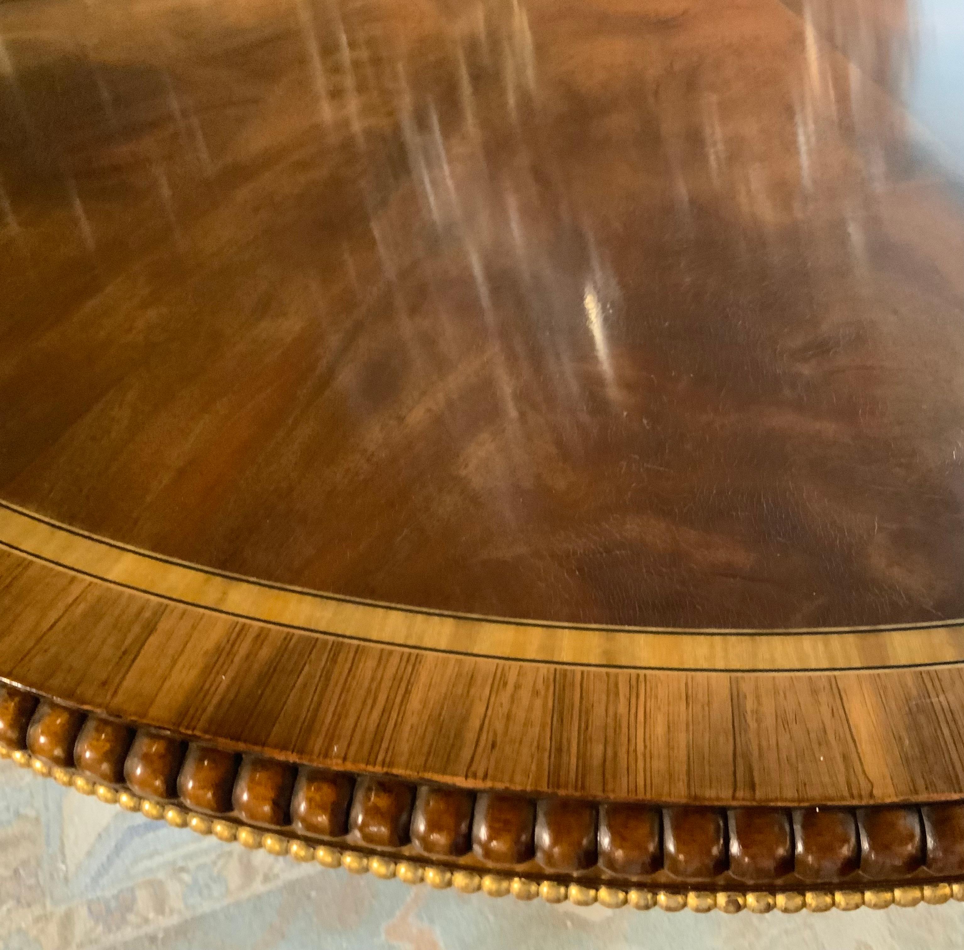 Regency Large  round regency style dining table converts to long oval For Sale
