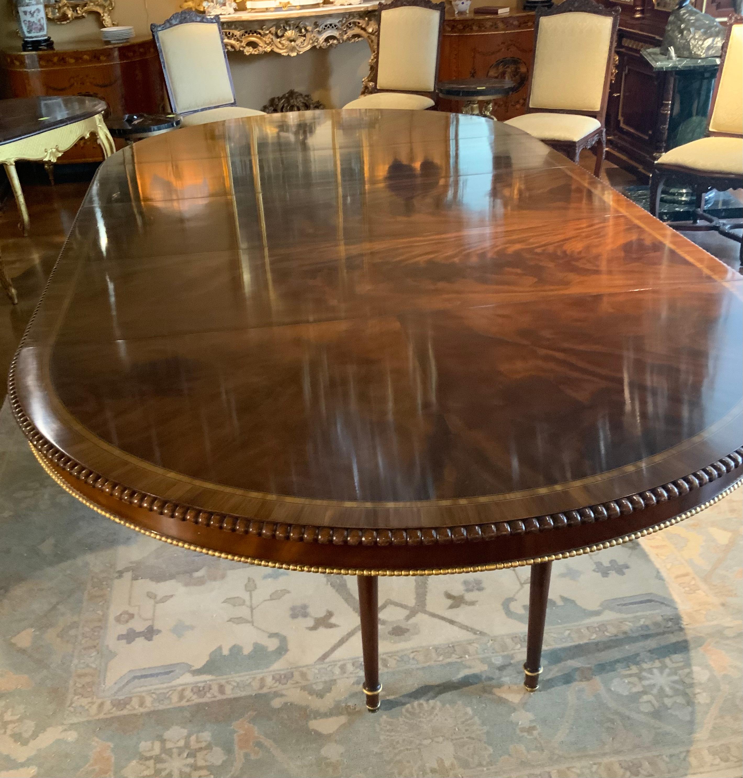 Mahogany Large  round regency style dining table converts to long oval For Sale