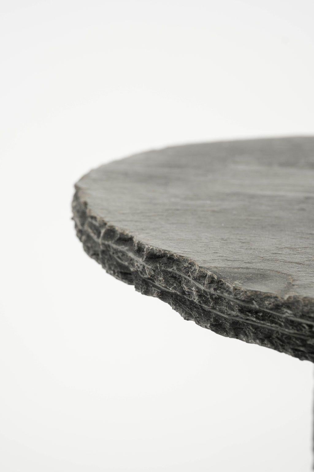 Large round riven slate table upon two-part slate base. Cut from vintage and antique slate.