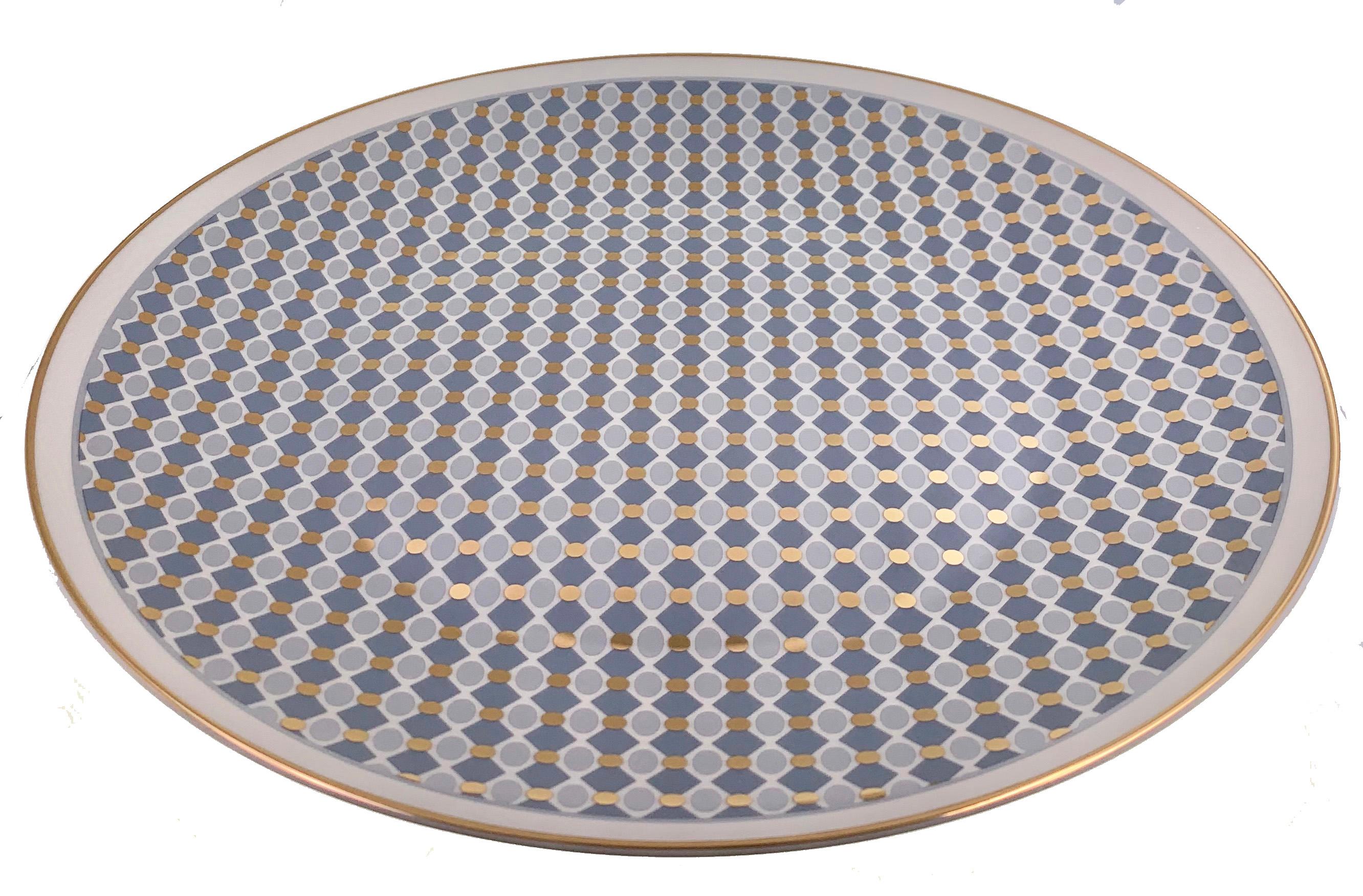 Larger quantities available upon request, with 8 weeks production time.

Description: Large round serving plate
Color: Blue and gold
Size: 37Ø x 3H cm
Material: Porcelain and gold
Collection: Modern Vintage