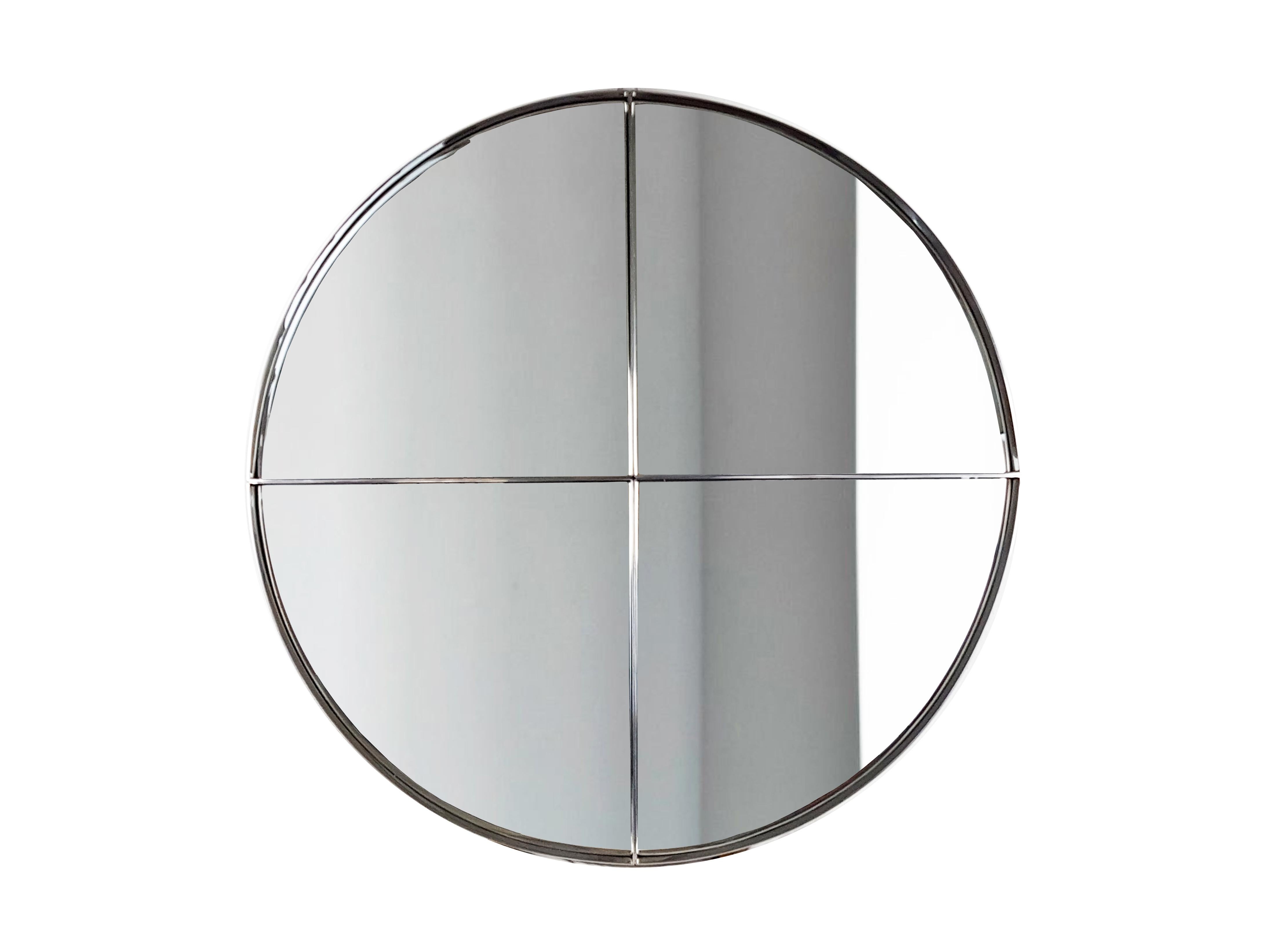 This mirror has considerable dimensions (120 cm in diameter) and is formed by 4 segments of circle, joined together by a pair of screws on the back of the structure. Due to its considerable weight, the mirror could be shipped in 4 separate parts.