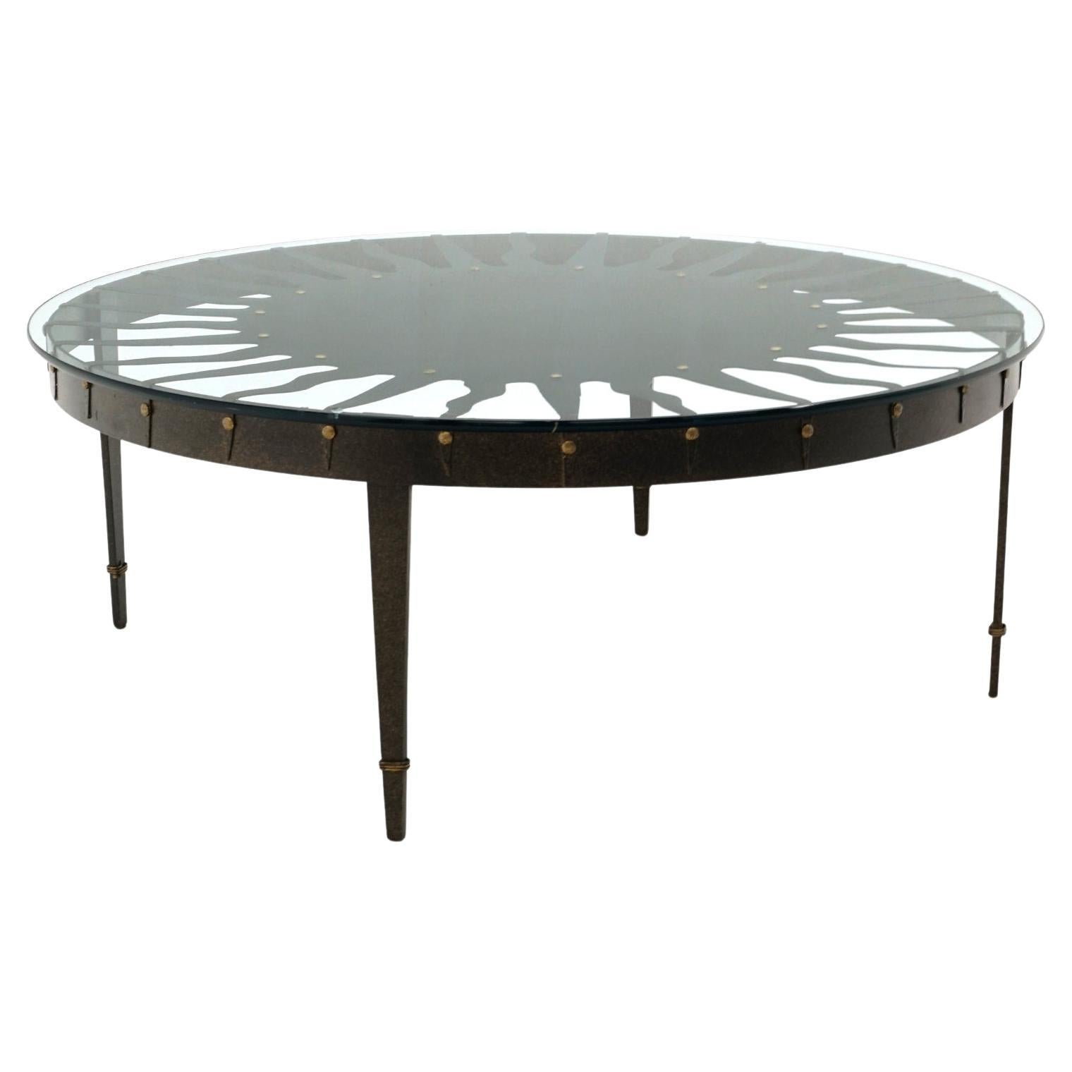 Large Round Sunburst Coffee Table.  Iron Base and Glass Top.  Great Condition