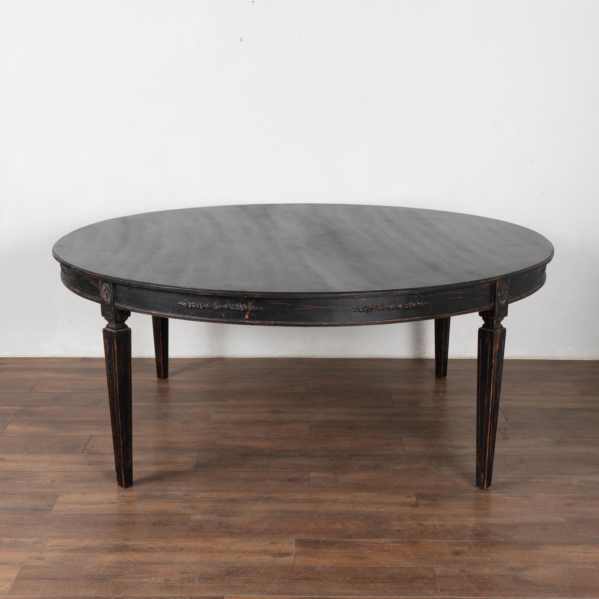Round dining table, 6' diameter with the look of the Gustavian style.
This size table did not exist in the Gustavian period; this new table mirrors the Swedish style in a larger size suited for today's modern home.
Lovely tapered fluted legs,