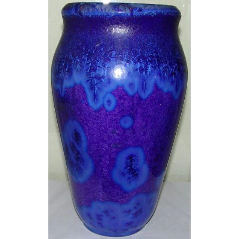 Large Royal Copenhagen crystalline glaze vase by Carl Frederik Ludvigsen No 7.

Measures 34cm and is in good condition. Signed with his monogram and No 7. So this is one of his very very first vases he signed and numbered. Covered in Crystals all