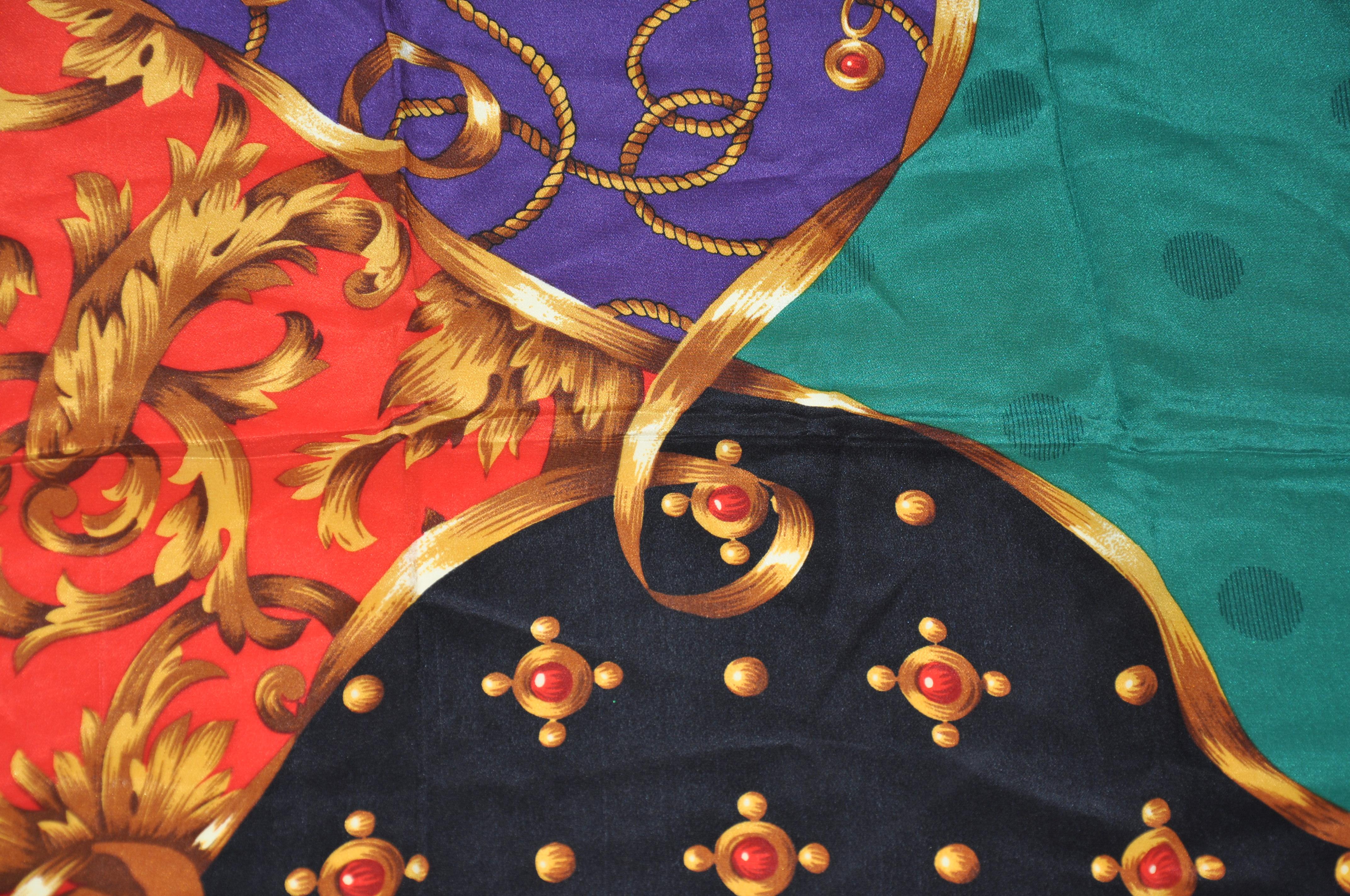     Merveilleusement riche et vif, ce grand foulard en soie à motifs de bordures rouge royal et d'accents dorés, aux bords roulés à la main, mesure 34 pouces sur 33 pouces. Fabriquées en Italie.