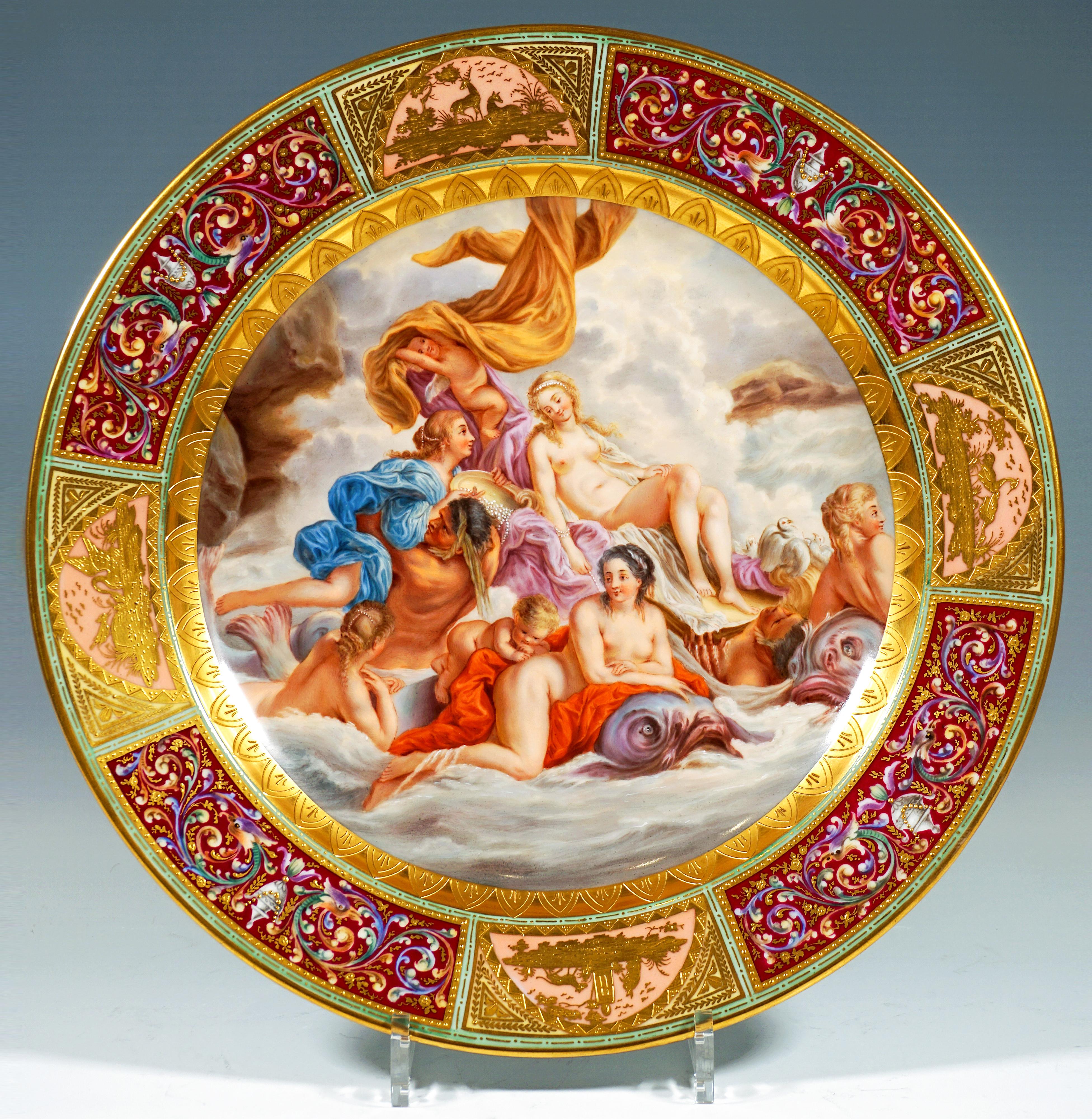 Large, lavishly decorated porcelain plate: the centre of the plate is completely filled by a finely painted polychrome image, framed by a broad band of gold-painted palmettes: according to Greek mythology, Venus was born, when her mother Gaia,