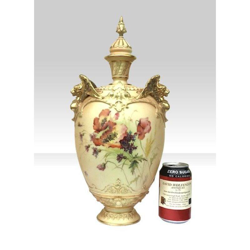 Fabulous large Royal Worcester blush ivory vase,urn with cover painted with wild poppies and foliage in the manner Edward Raby. 

Date mark 1899, 
Shape 1619. 
41.5cm high x 20cm wide x 18cm deep 
(16.4 inches high) 
 
Declaration: This item