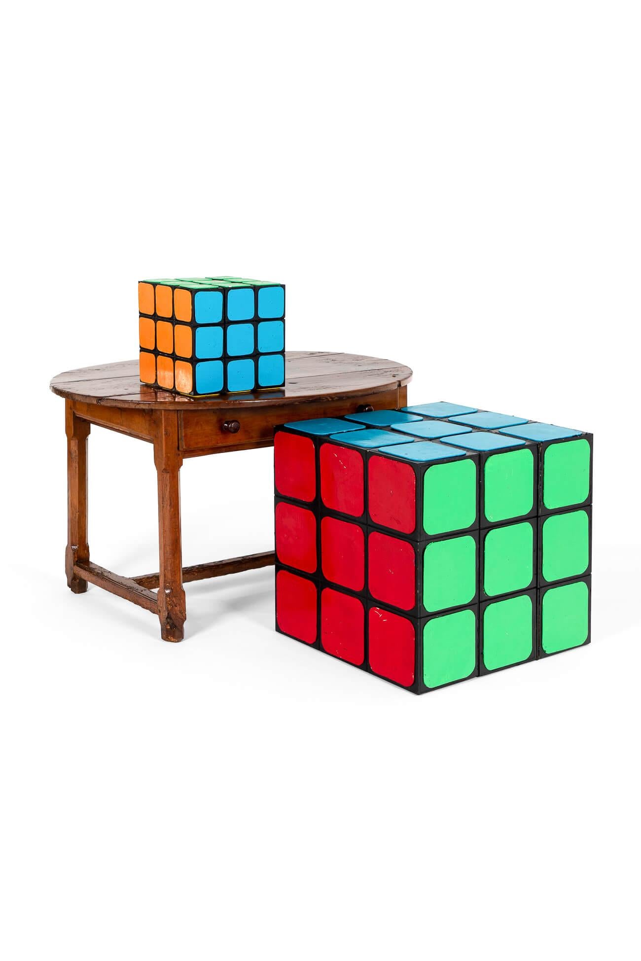 A fun pair of Rubik’s cube shop display models from a children’s toy shop.

The pair of cubes were commissioned by a toy shop for the promotion of the famous invention by Erno Rubik.

The set designed models made from wooden painted panels can be