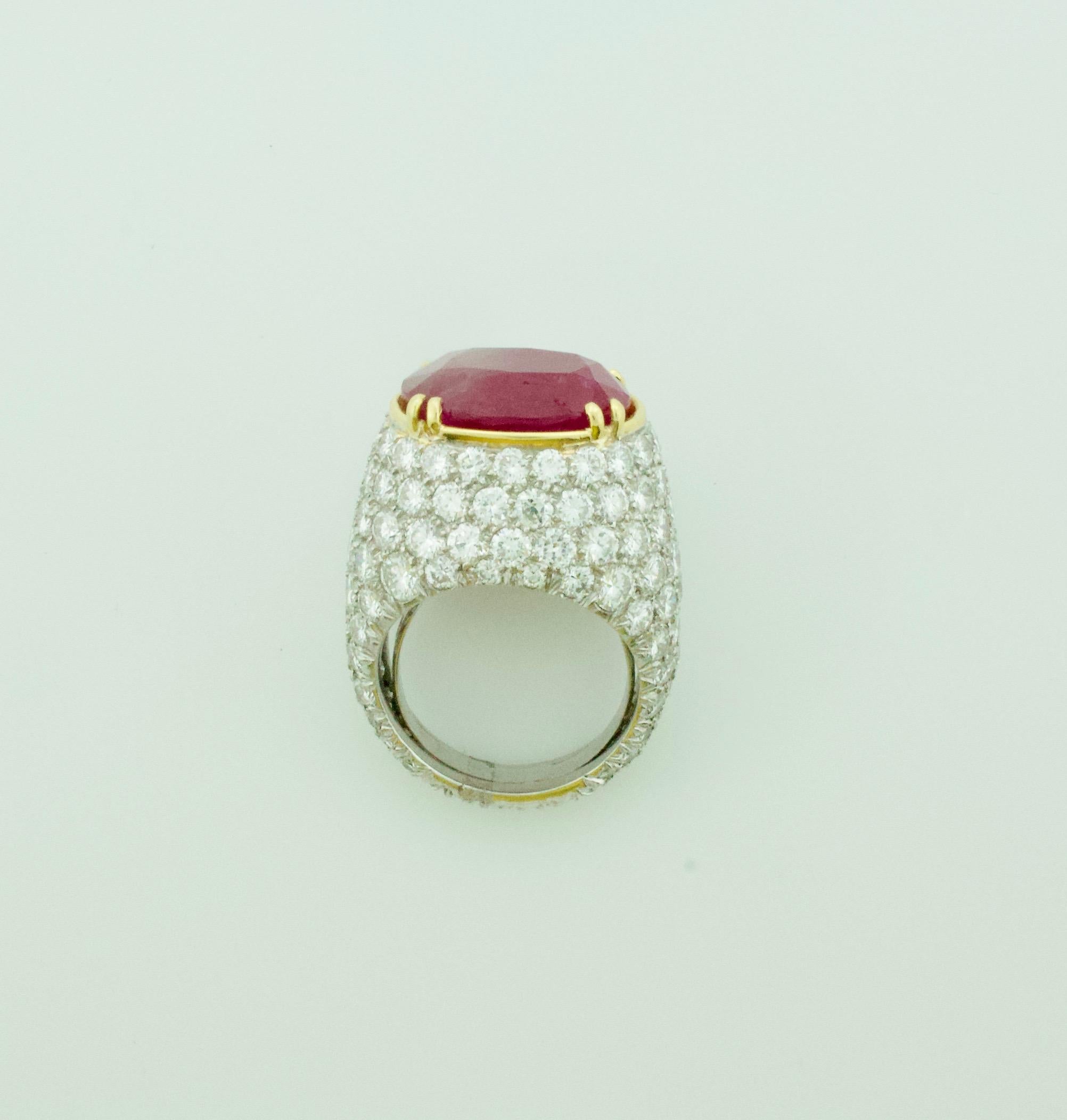 Large Ruby and Diamond ring in Platinum 
One Oval Cut Ruby Weighing 10.00 Carats Approximately 
One Hundred and Forty Eight Round Brilliant Cut Diamonds Weighing 7.50 Carats Approximately 
Currently Size 5.5 Can Be Sized By Us Or Your Qualified