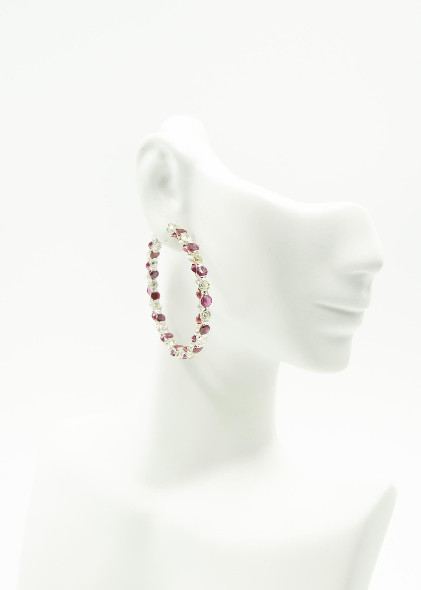 Impressive diamond hoops with 5 carats of rubies and 5 carats in European cut diamonds set in 18k white gold.