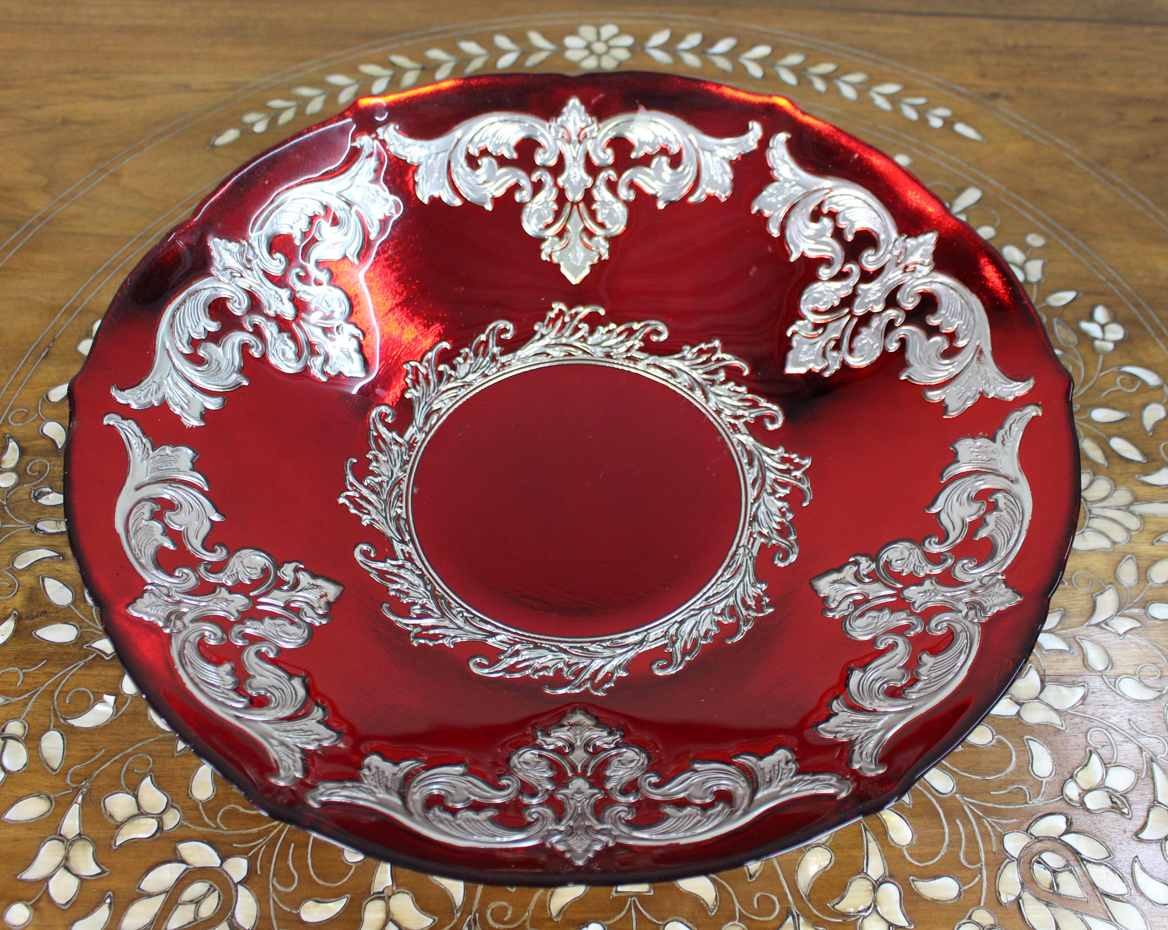 Large Ruby Flashed Glass Bowl with Ornate Silver Overlay

A large and richly decorative ruby flashed glass bowl with ornate silver overlay, dating to the late 20th century. Of continental European origin — likely German or Bohemian — the bowl