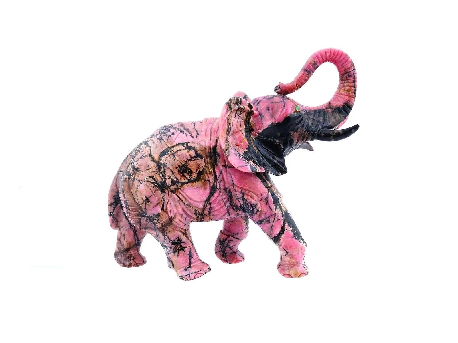 A naturally hand carved rhodonite figurine. The figurine is made in the shape of an elephant, set with gemstone eyes in gold settings. Vintage and Modern Carving, Natural Stones Figurines, Figures, Statues, Home Decor, and Collectibles.
Dimensions: