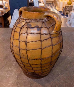 Large Rustic Amphora in Glazed Ceramic Covered with Original Iron Mesh