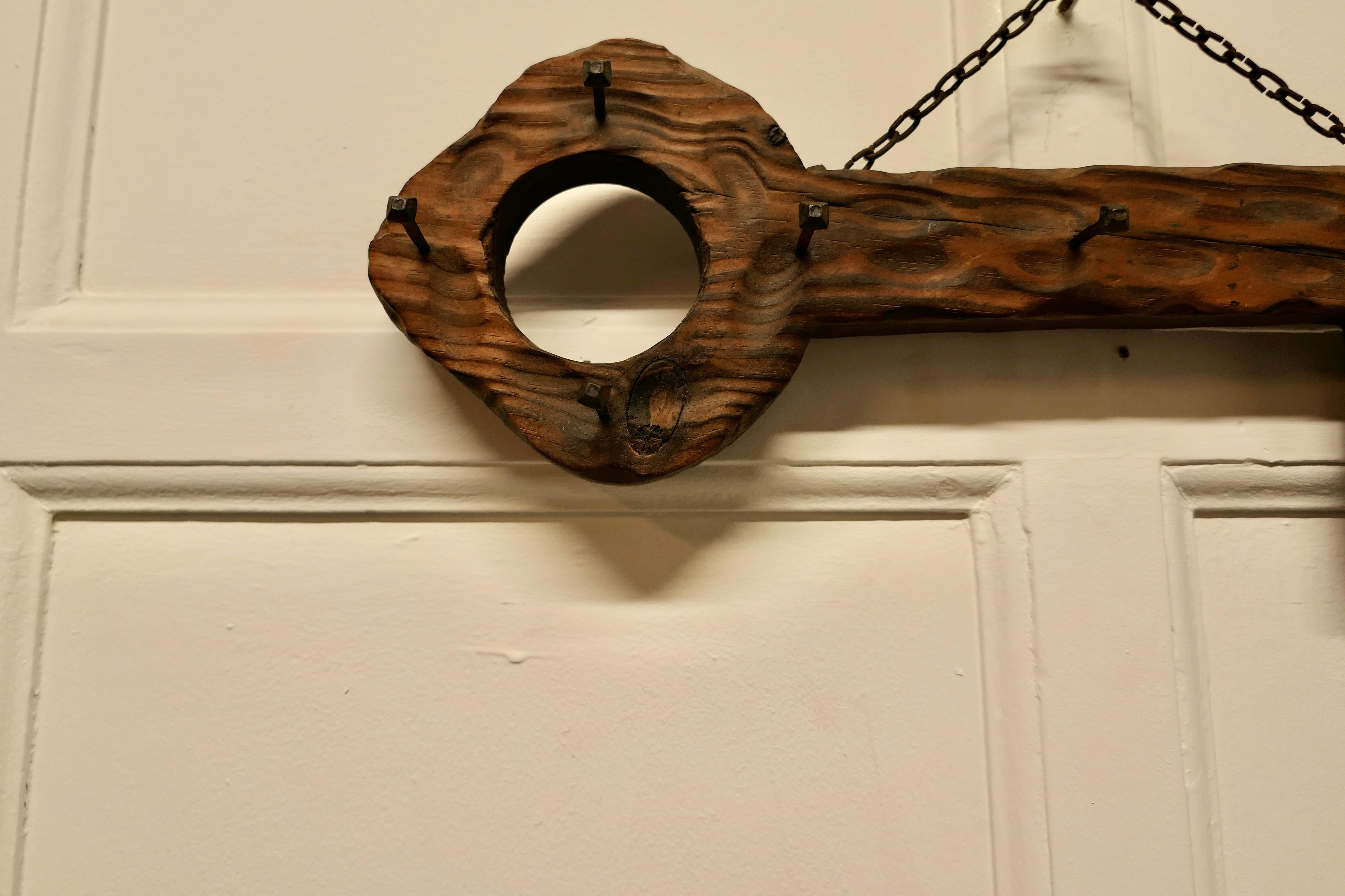 Large Rustic Cedar wood key hanging rack

Carved from one piece of Cedar with 8 blacksmith made iron key hooks
Measures: The rack is 6”high, 20” long and 2.5” deep
CC167.
  