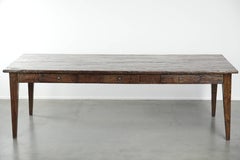 Large rustic dining table made of atmospheric elm wood with fine details