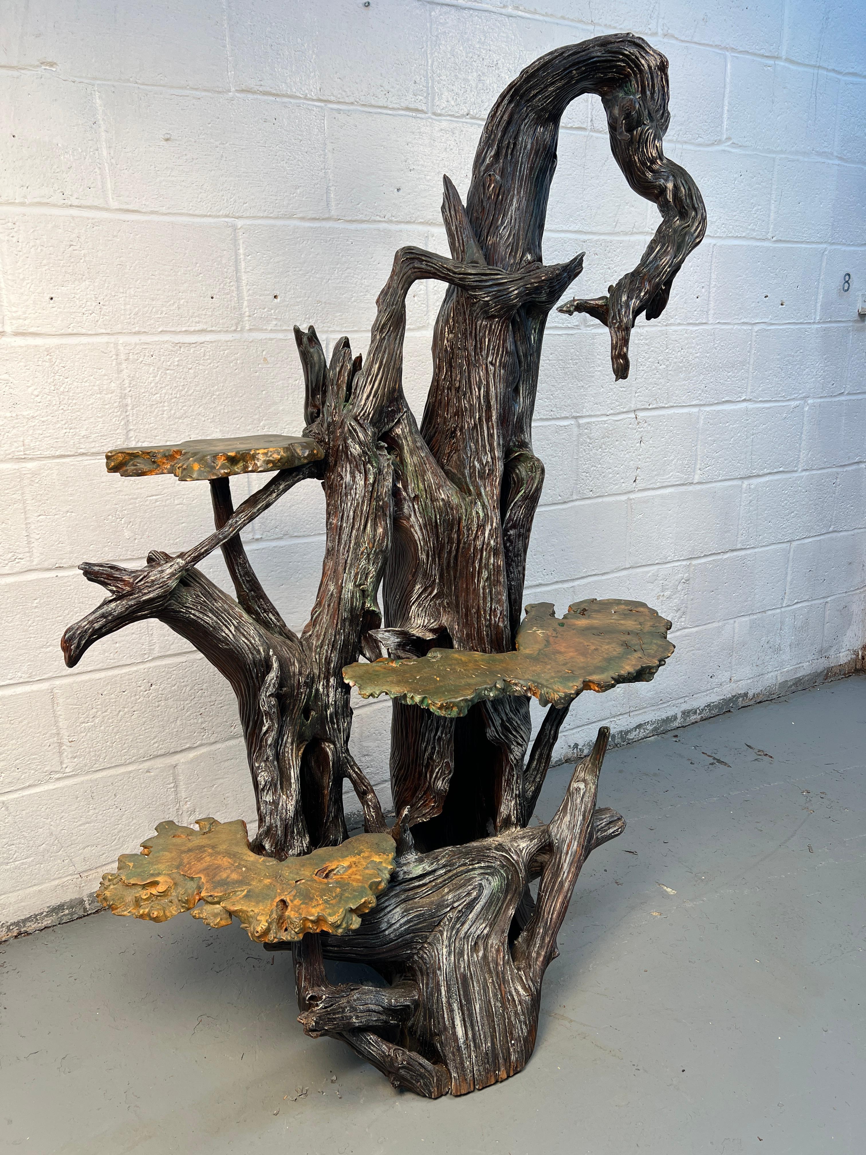 This tall tree shelf has been made from repurposed wood with three shelves made of burled wood. This contrast makes for an unusual and attractive take on the typical Asian plant stand.
Please confirm location with vendor NY or NJ