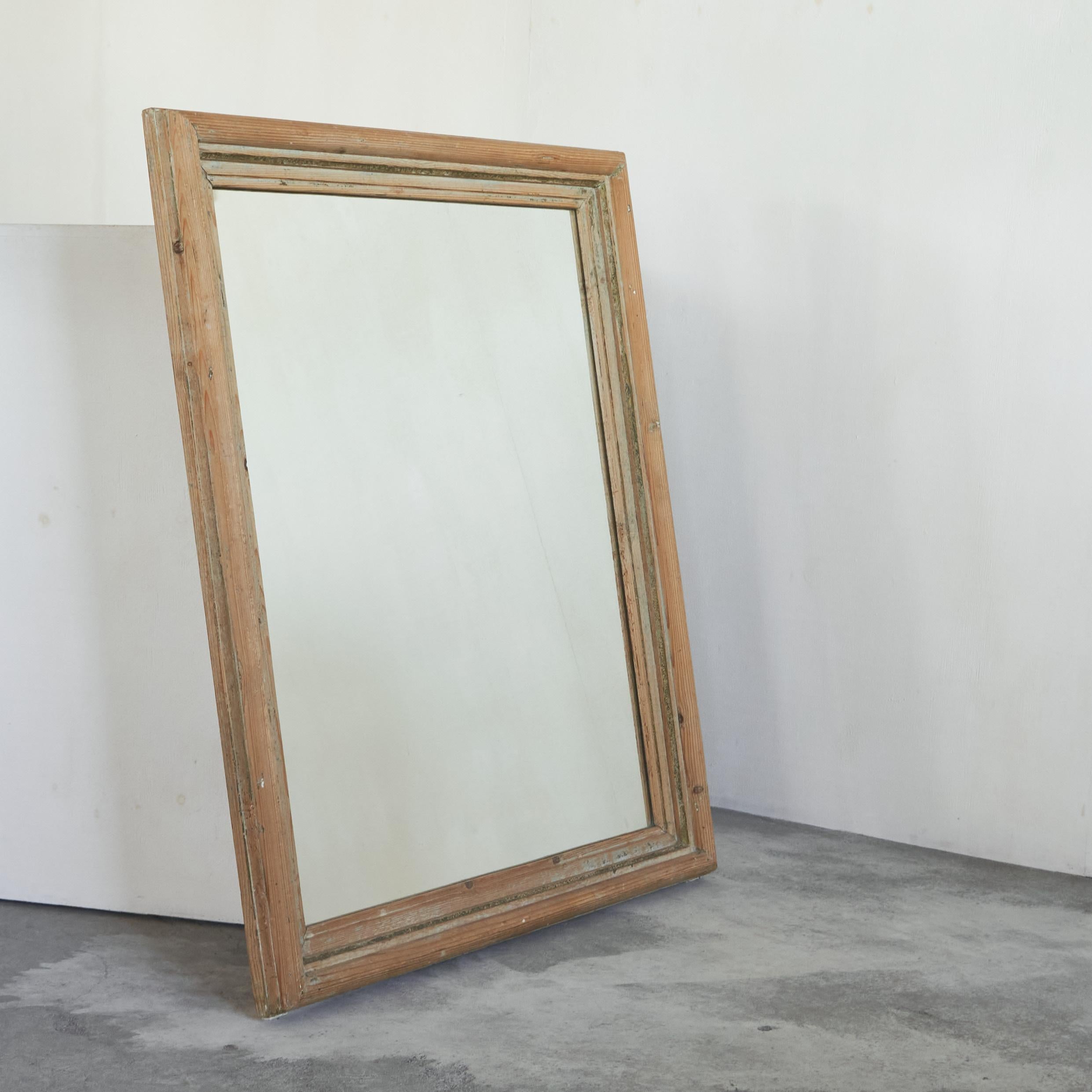 Large Rustic Mirror in Pine and Faded Paint

Beautiful and large wall mirror in pine with hints of faded old paint. The mirror has a wonderful rustic and timeless style and would be perfect for any elegant interior. The shape is very modest, but the