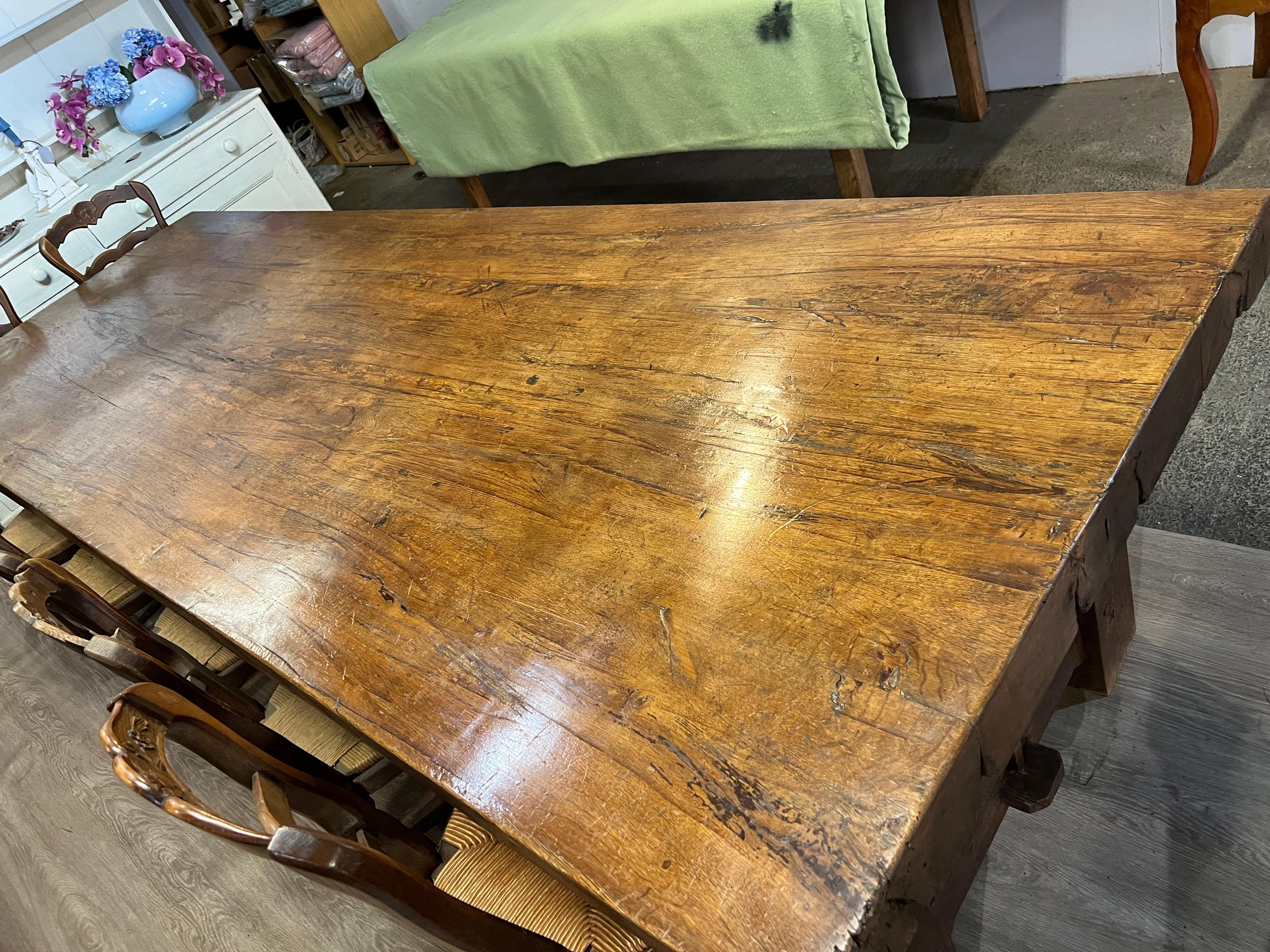 Large thick top oak farmhouse table. This table is very impressive its very wide and has a 10cm thick top which sits on a very sturdy chunky base.
    