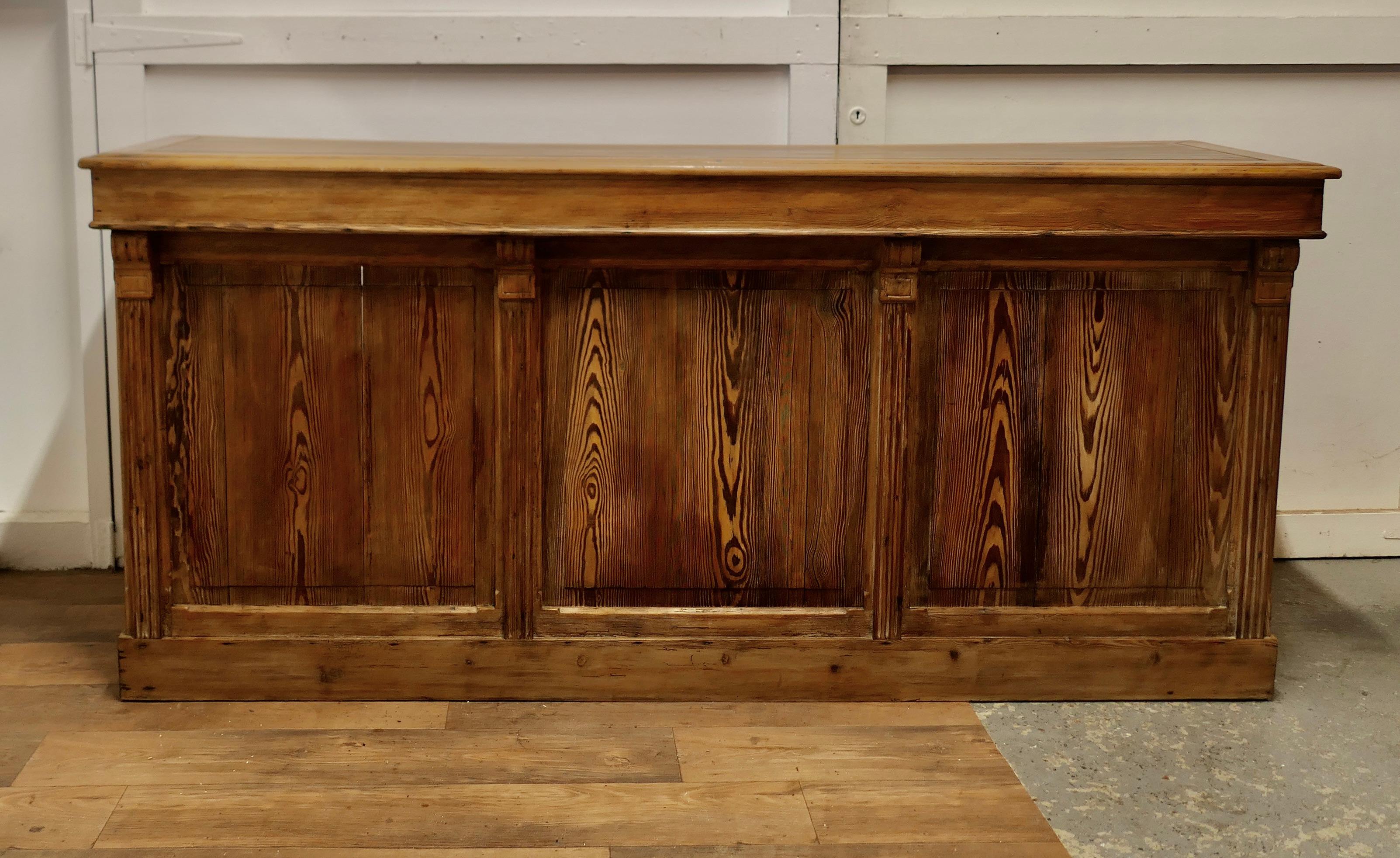 Large Rustic Pitch Pine Kitchen Island Counter, Dry Bar

This lovely old counter has a 1” thick solid pine panelled top, it has solid panelled front and sides and inside there is a deep storage shelf
This is a very heavy chunky piece, the dresser