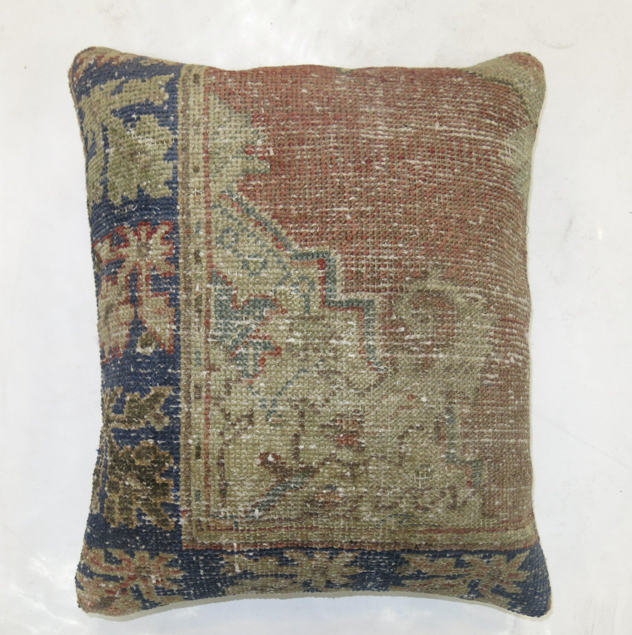 Pillow made from an old early 20th-century turkish oushak rug

Measures: 1'7'' x 1'10''