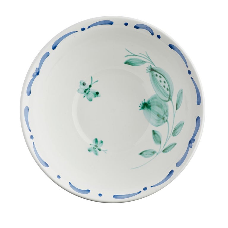 Large hands-free painted ceramic bowl. Decorated with a handpainted green pomegranate decor in the center with butterflies and a hands-free painted garlande in blue inside and outside. The garlande can be ordered in different colors. Produced in