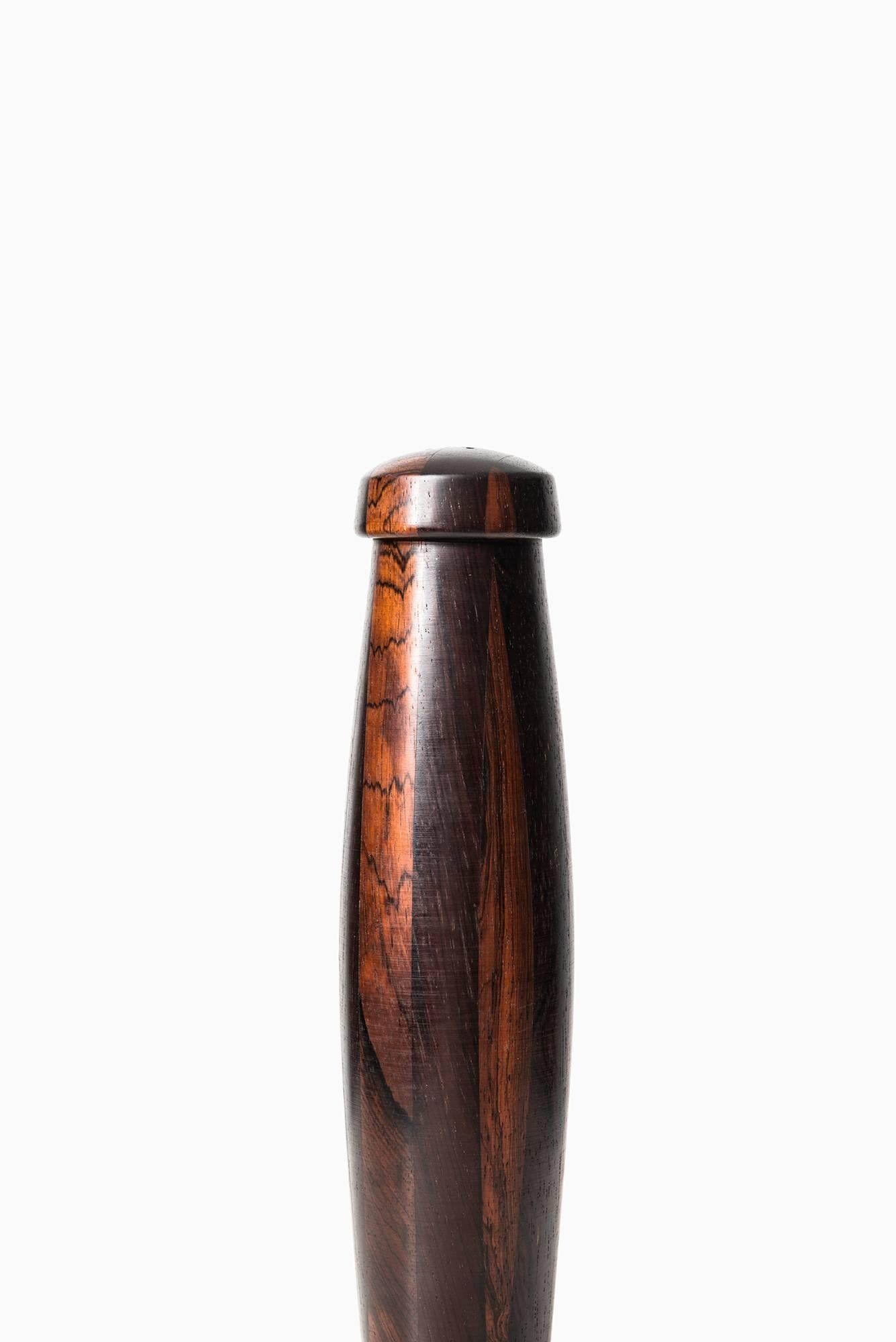 Rare and large salt shaker in solid rosewood. Produced in Denmark.